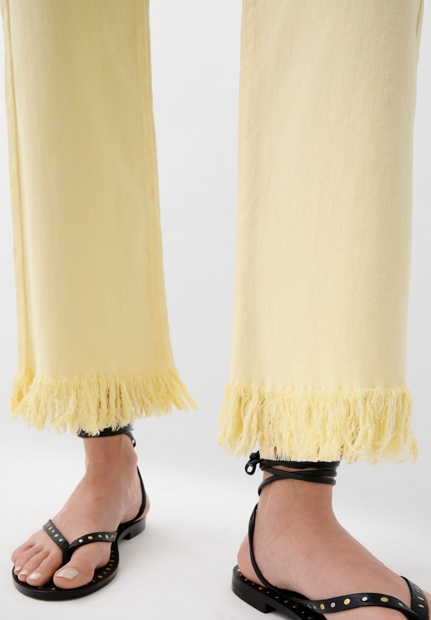 EMBROIDERED FRINGED JEANS