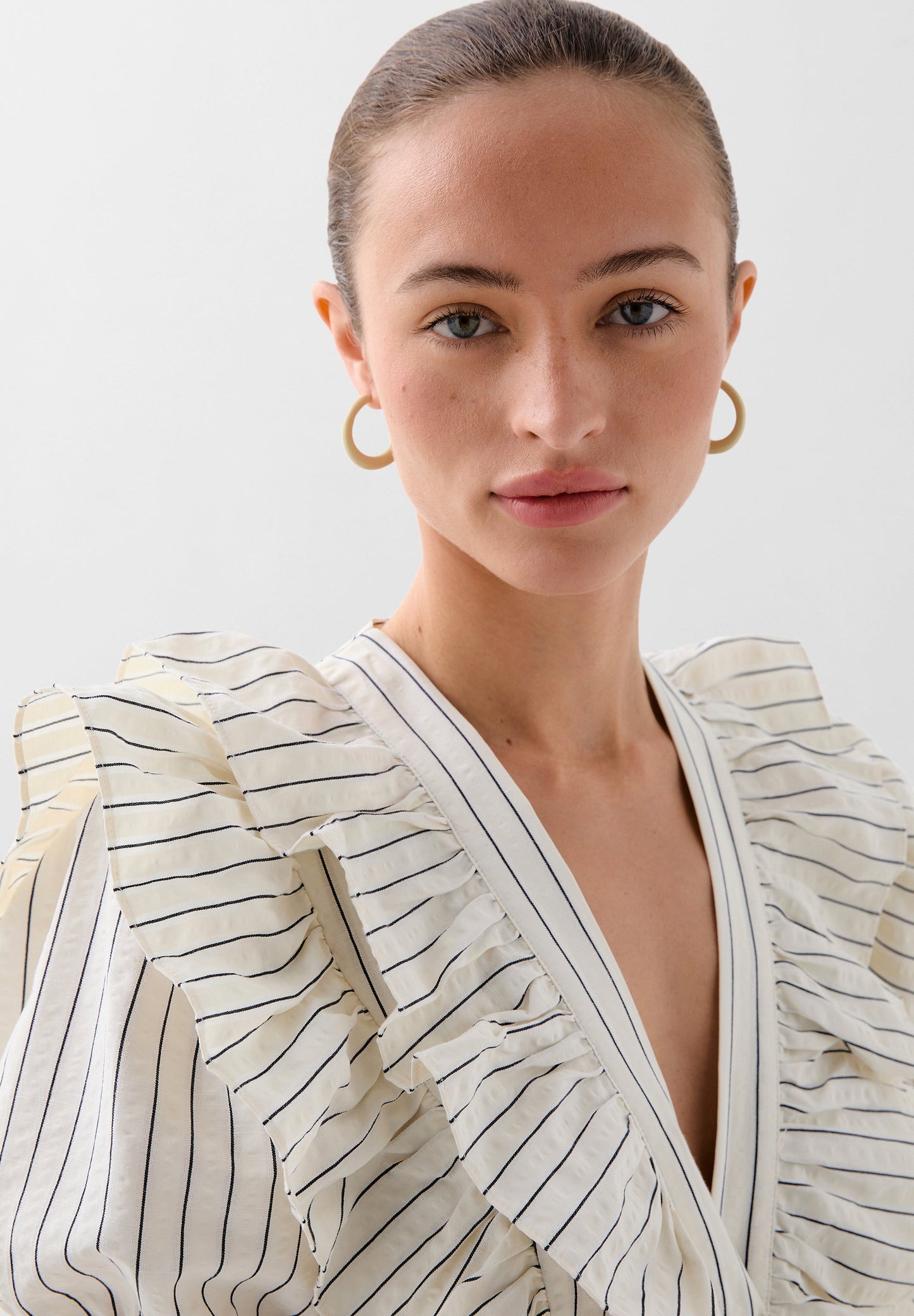STRIPED JUMPSUIT WITH RUFFLES