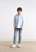POLO NECK SHIRT WITH CONTRAST SKULL PRINT