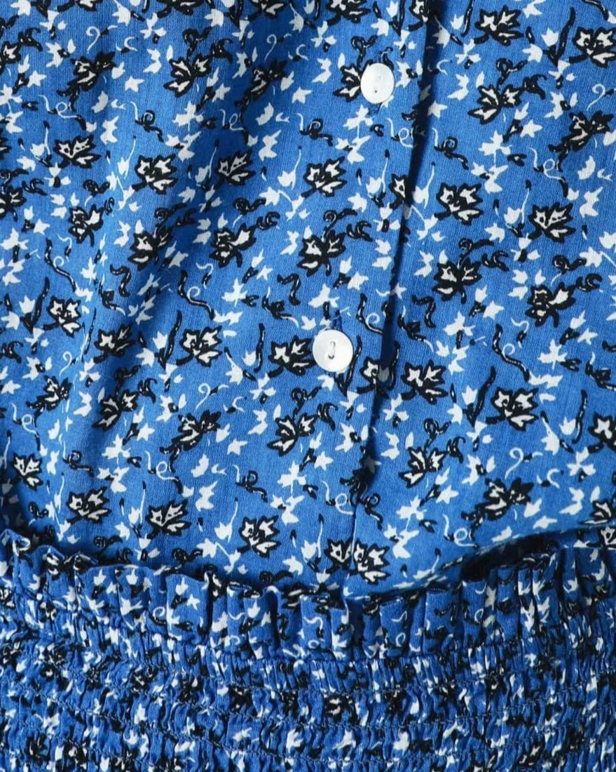 CAMISA FLORES VOLANTES