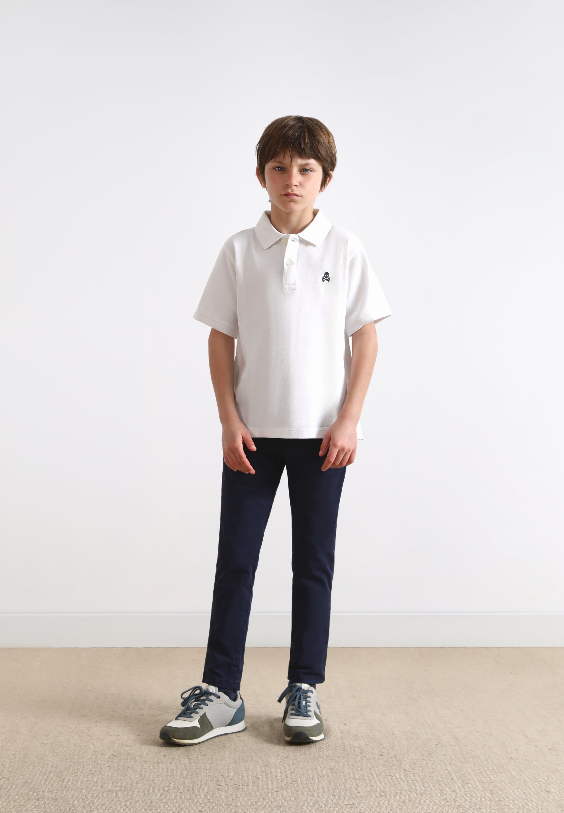 BASIC POLO SHIRT WITH SKULL DETAIL