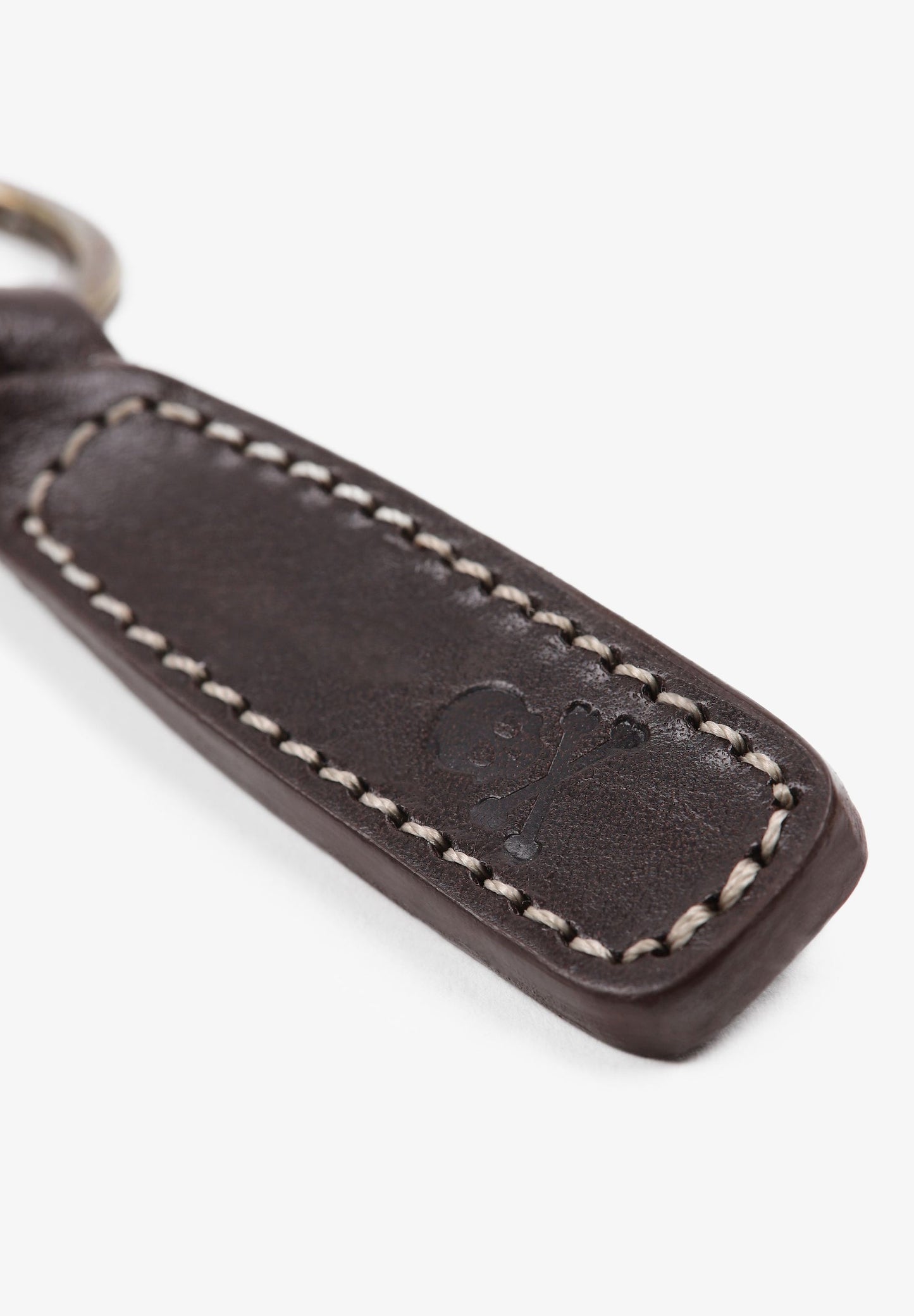 LEATHER KEYCHAIN WITH ENGRAVED SKULL