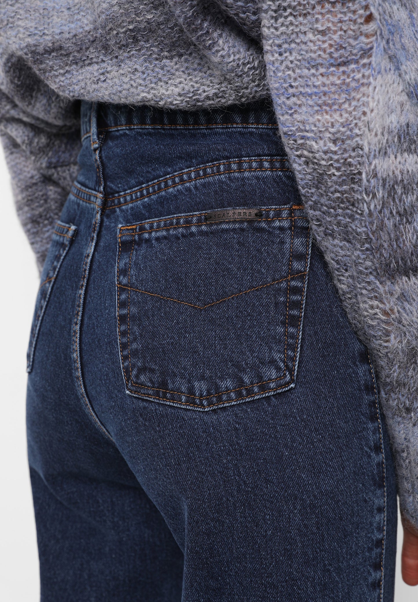 FLARE JEANS WITH BUTTON POCKETS