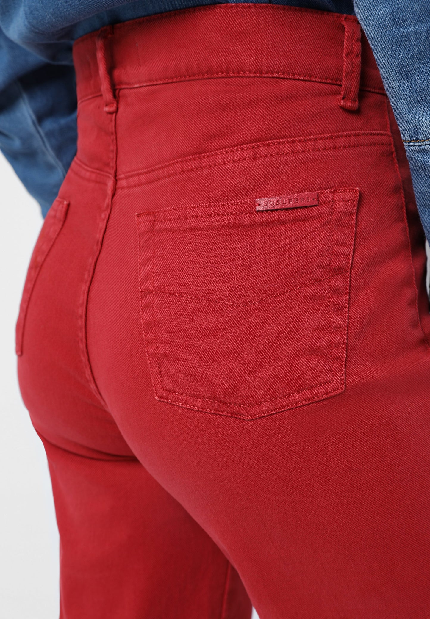 FLARE JEANS WITH BUTTON POCKETS