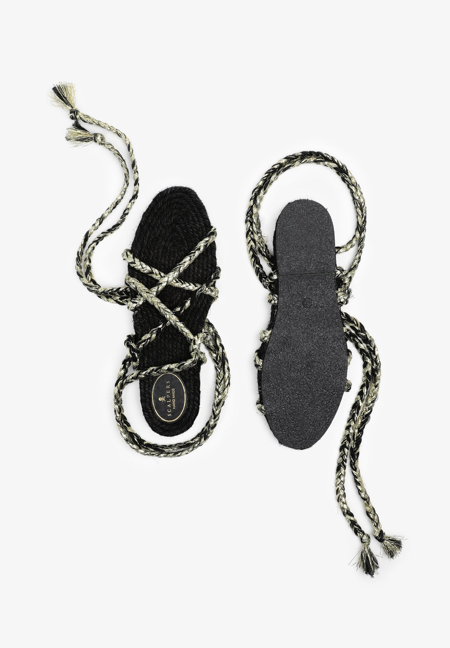 FLAT SANDALS TIED WITH BRAIDED CORDS