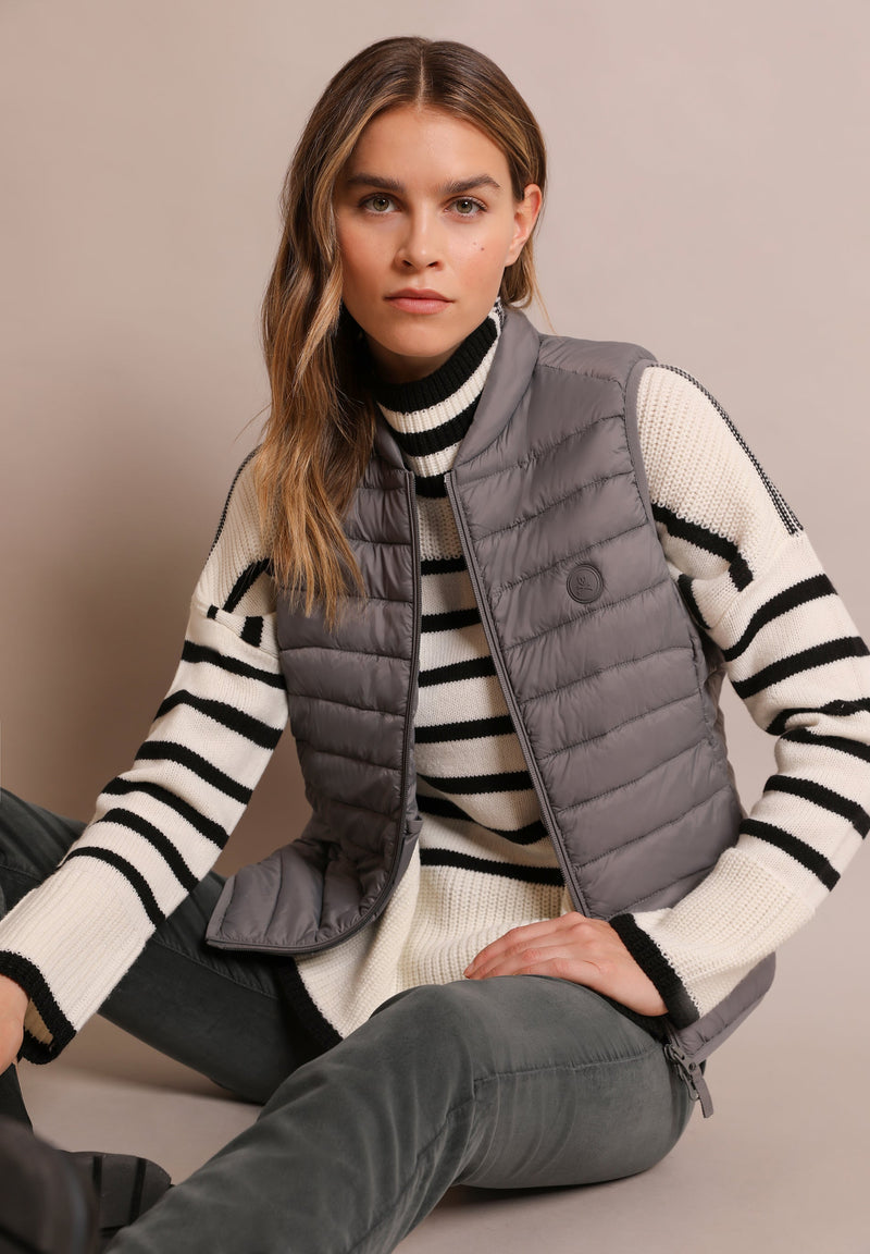 QUILTED GILET WITH SKULL DETAIL