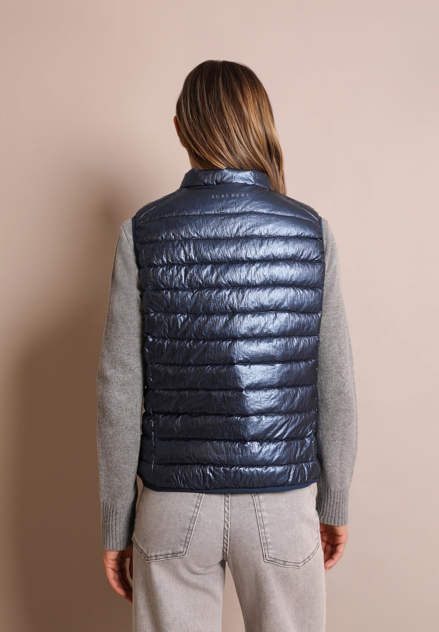 QUILTED GILET WITH SKULL DETAIL