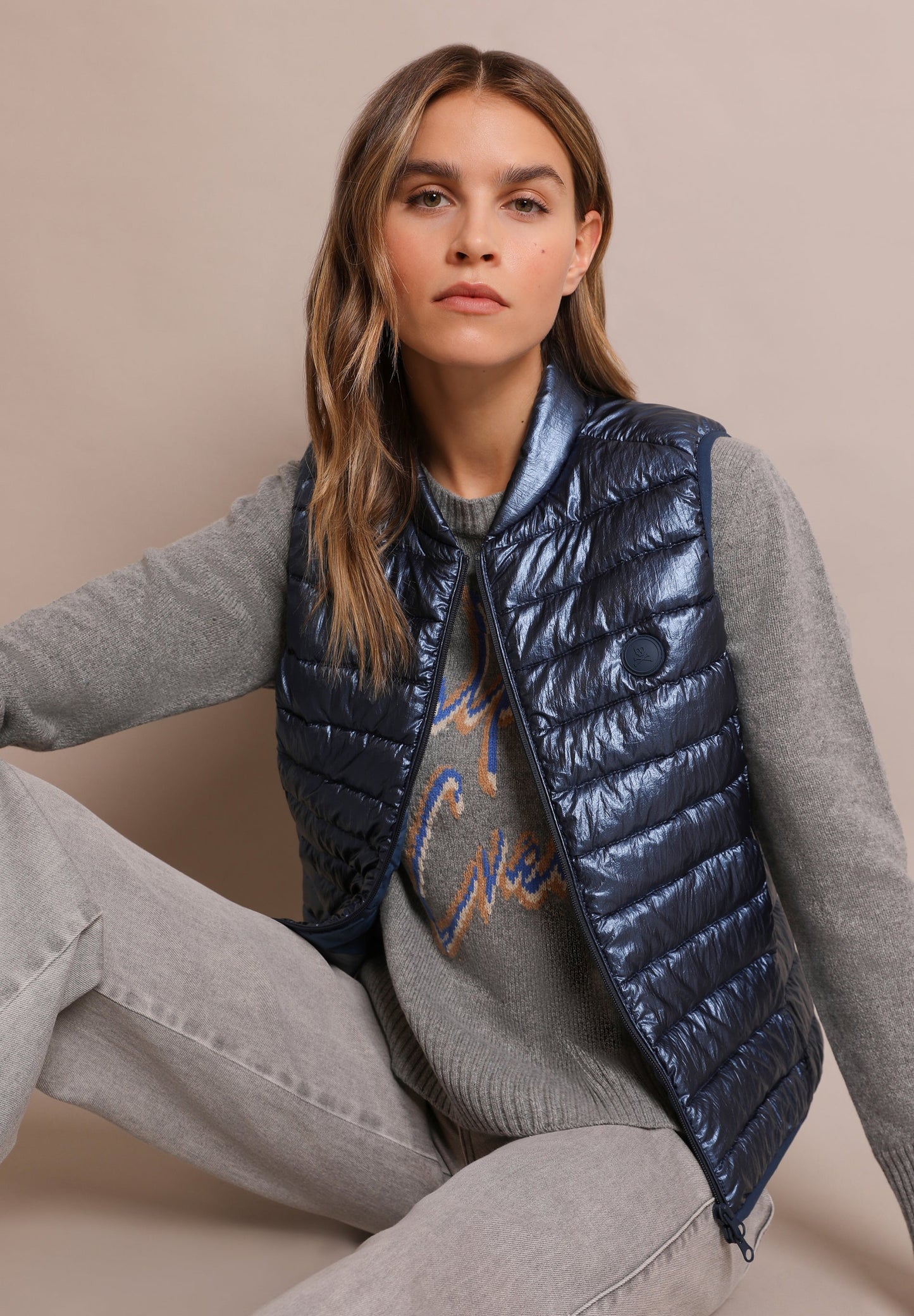 QUILTED GILET WITH SKULL DETAIL
