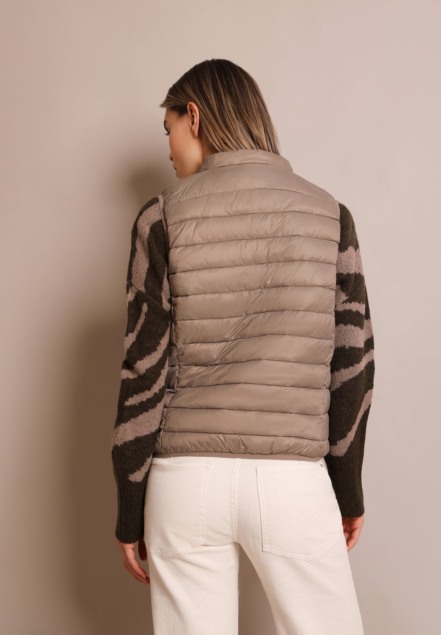 QUILTED GILET WITH SKULL DETAIL