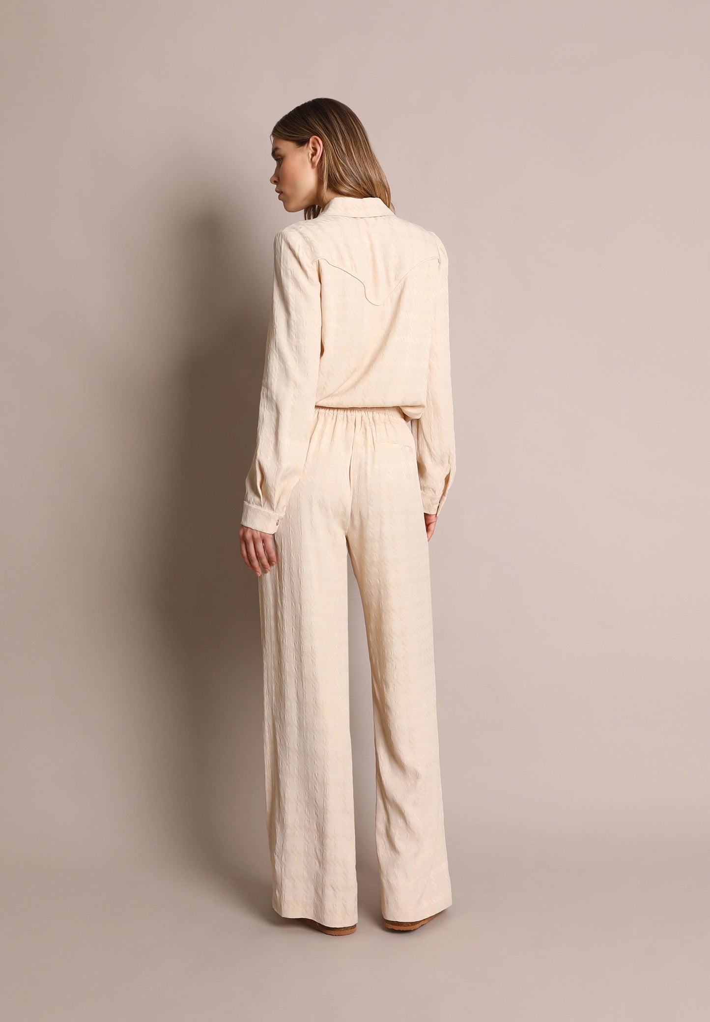LOOSE-FITTING FLARED TROUSERS