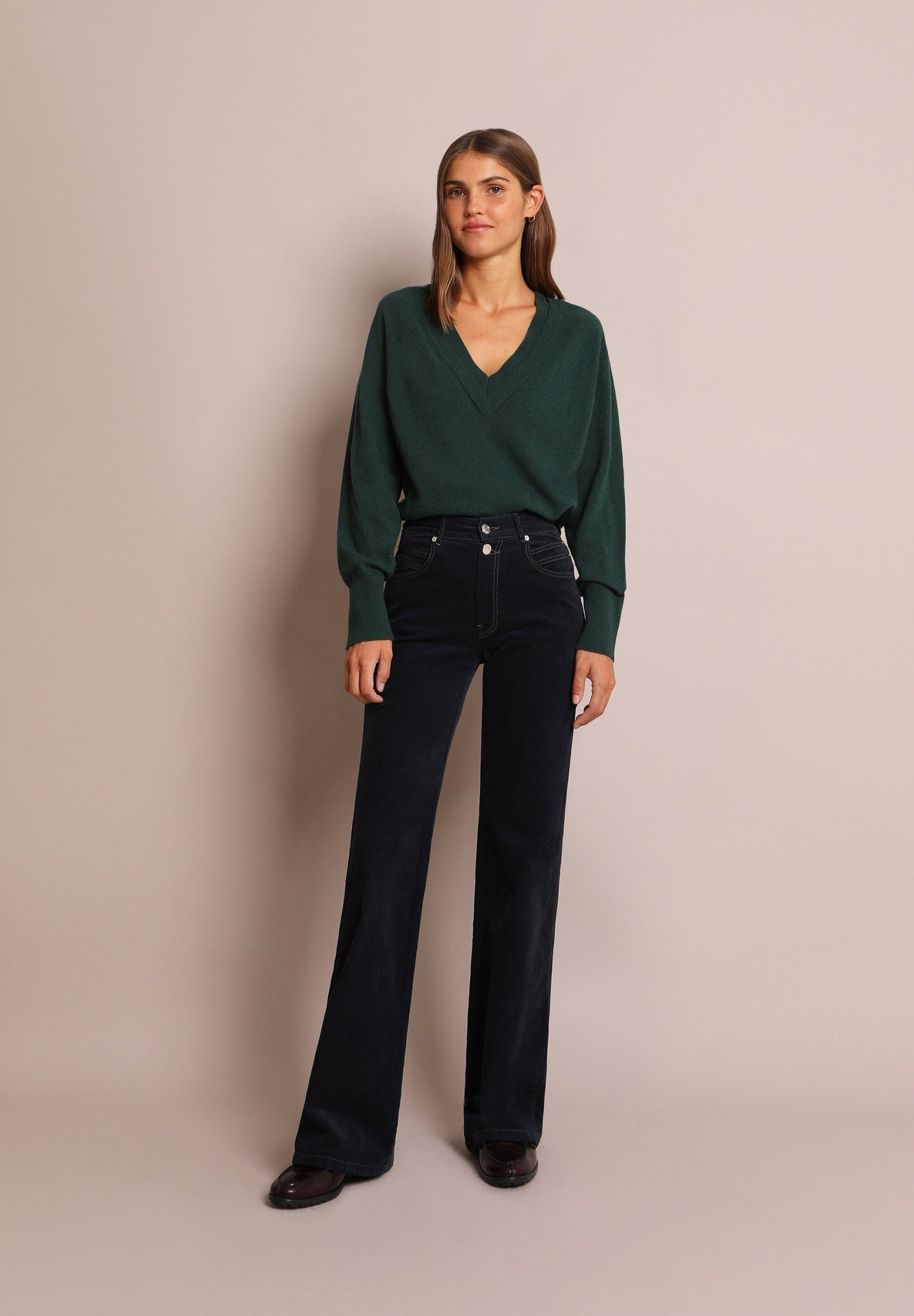 FLARED TROUSERS WITH DOUBLE BUTTON