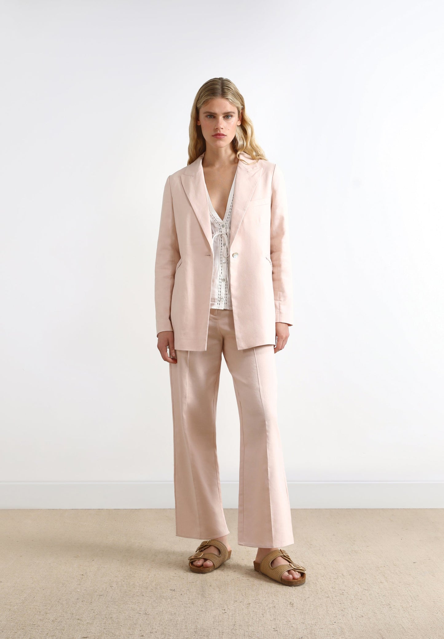 LINEN TROUSERS WITH BRAIDED DETAILS