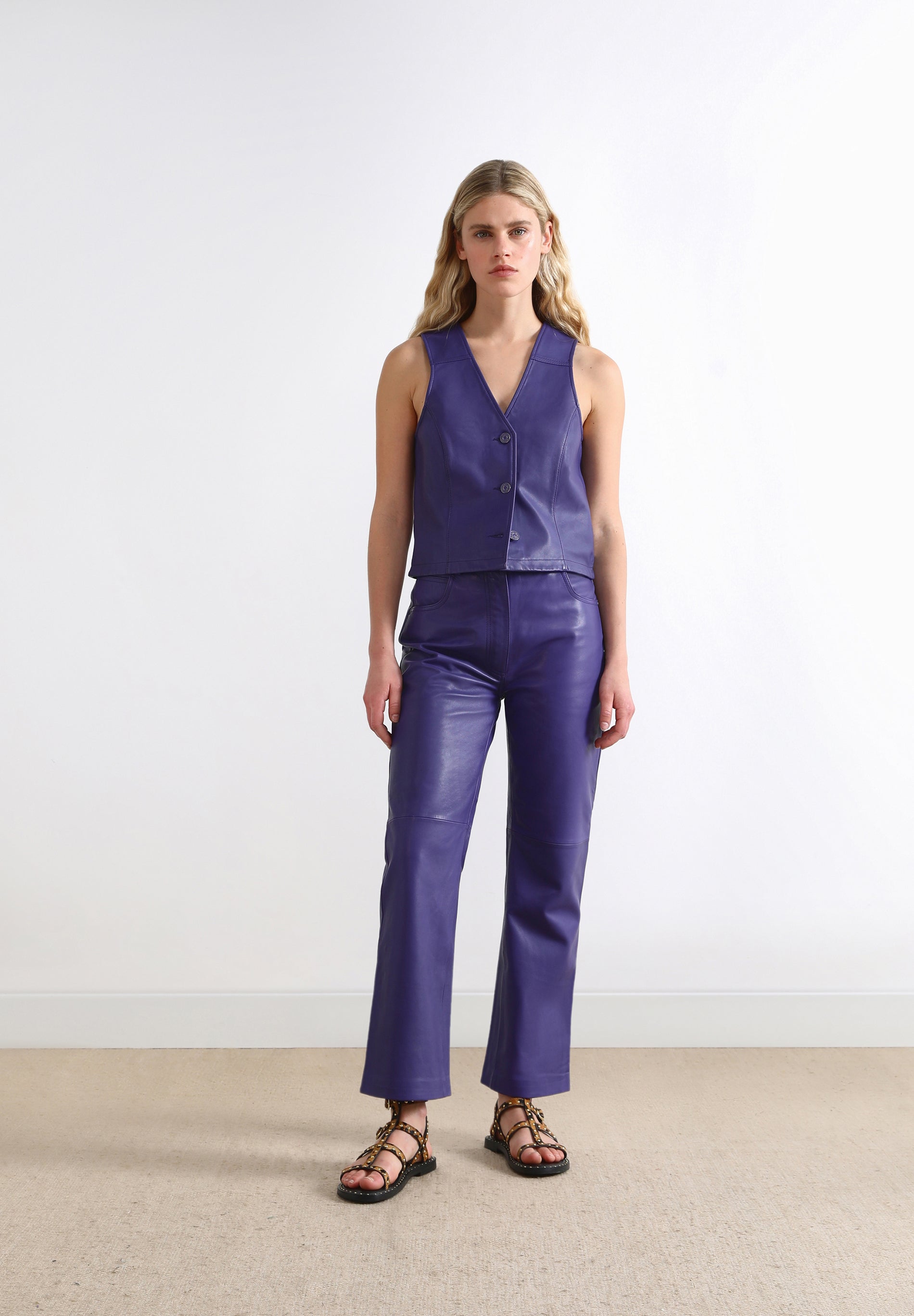 SLIM FIT FLARED LEATHER TROUSERS