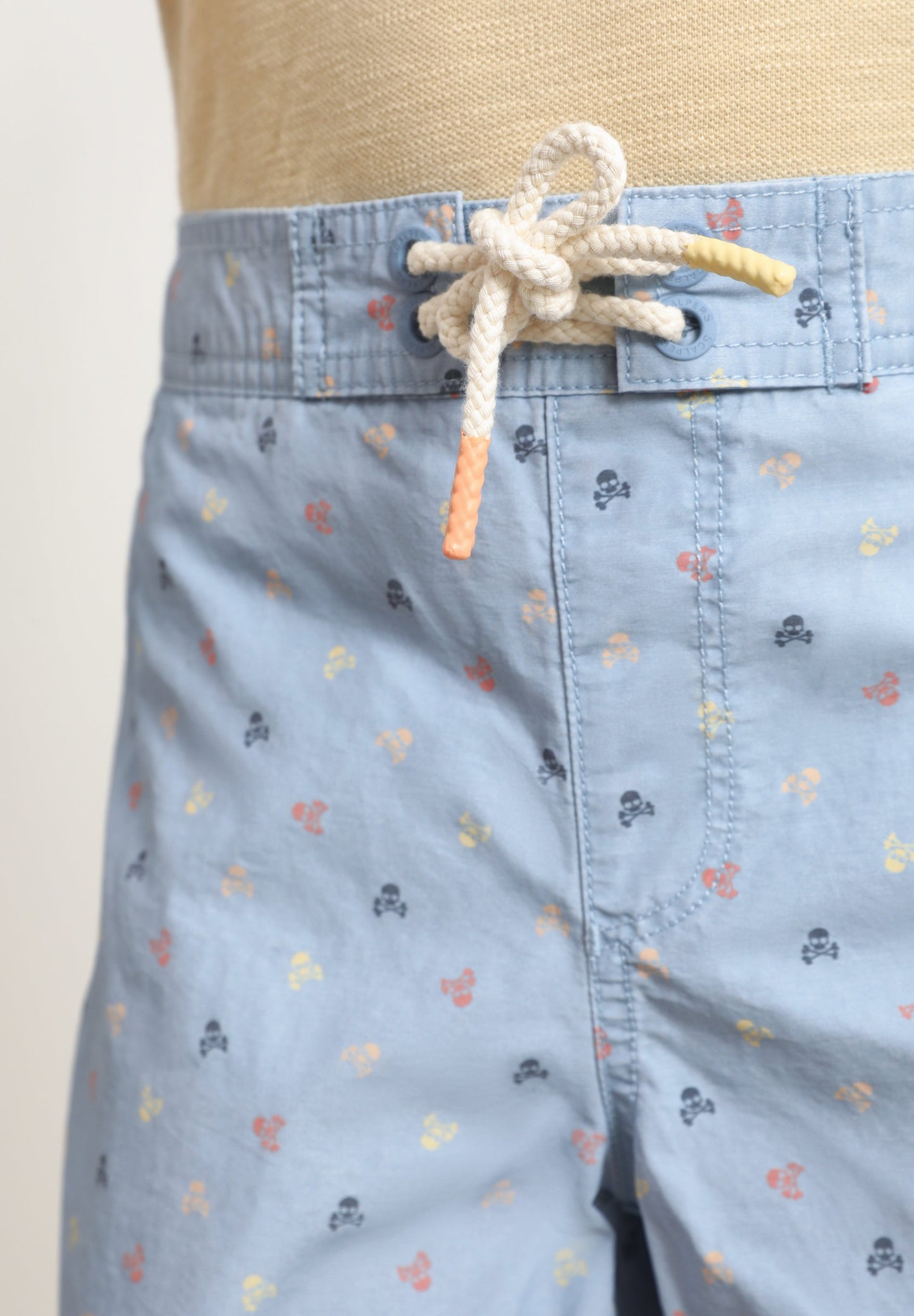 SWIMMING TRUNKS WITH ALL-OVER SKULLS