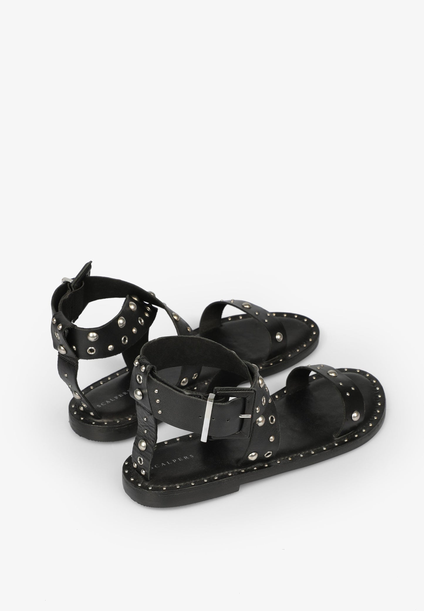 CROSSOVER SANDALS WITH STUDS