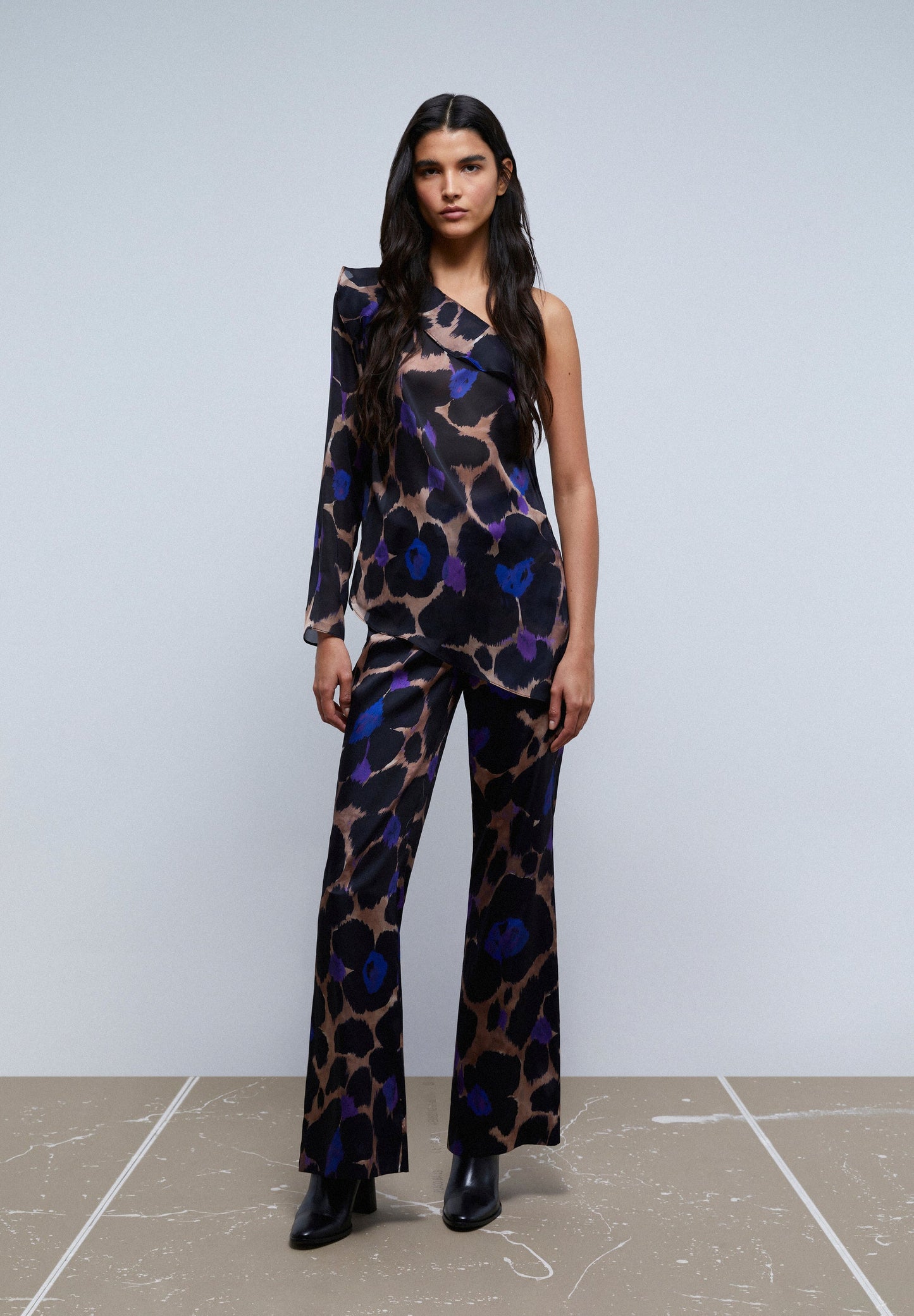 ASYMMETRIC ANIMAL PRINT BLOUSE