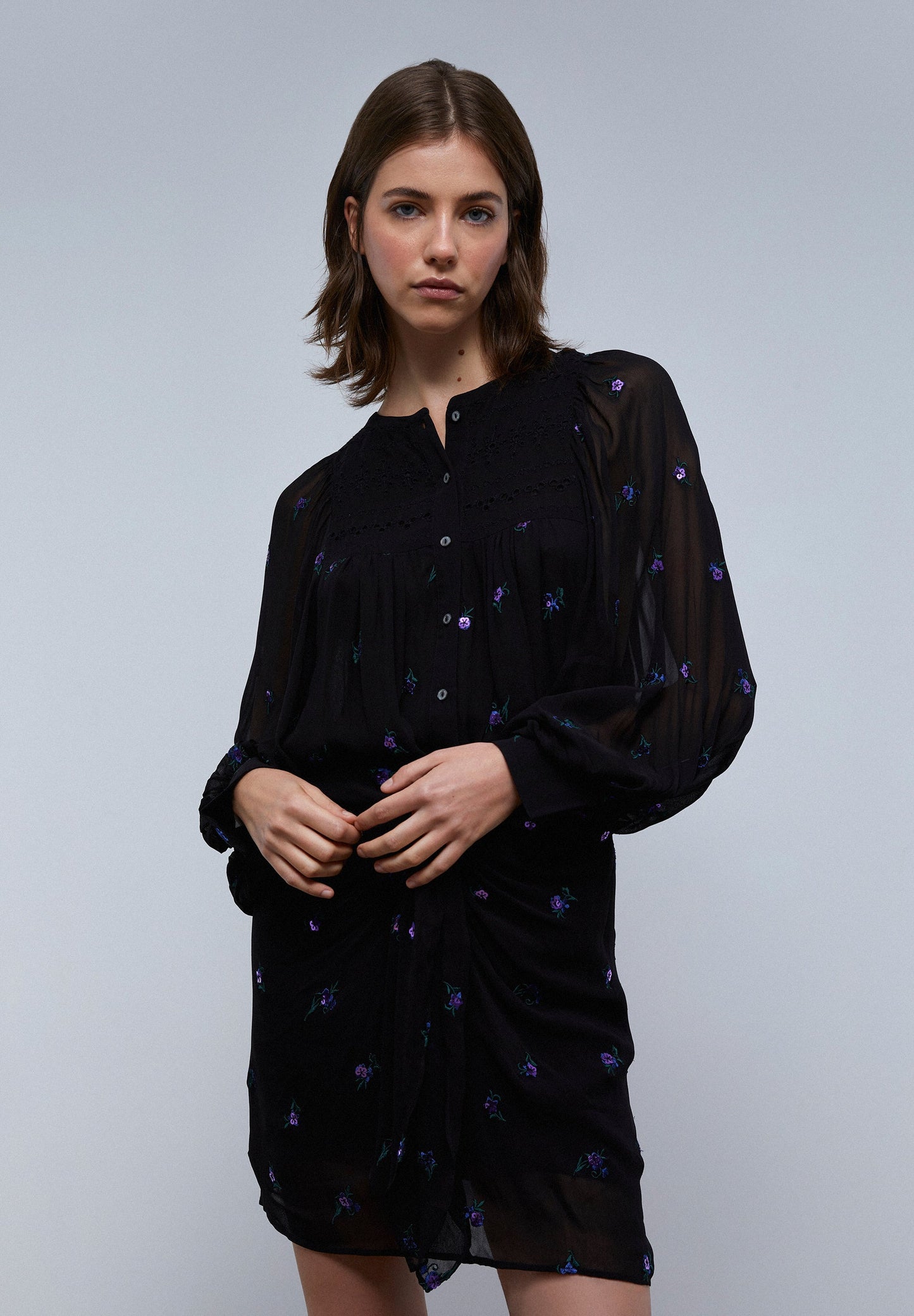 MINI SKIRT WITH KNOT AND FLORAL DETAIL