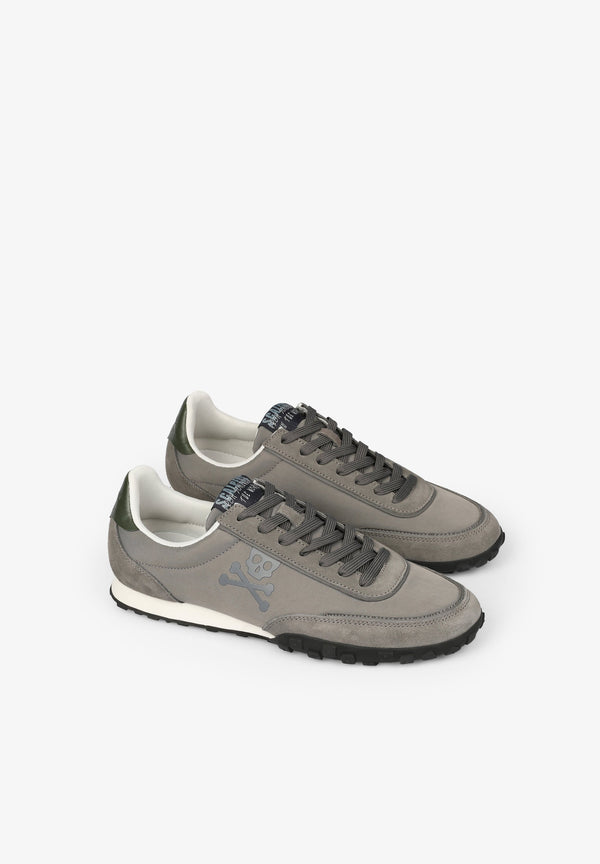 LOW SNEAKERS WITH SKULL PRINT