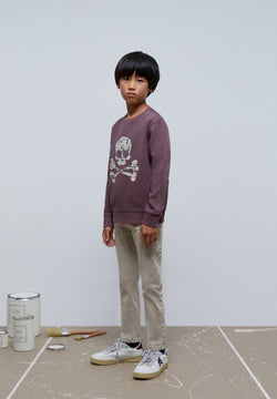 SWEATSHIRT WITH NEWSPAPER TEXT SKULL