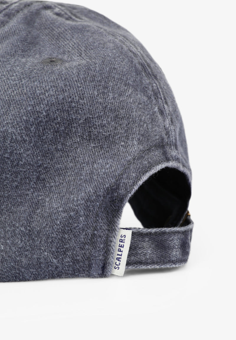 FADED CAP WITH SKULL DETAIL