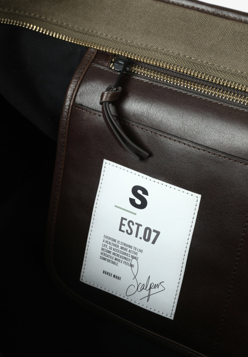 TRAVEL BAG WITH LEATHER DETAILS