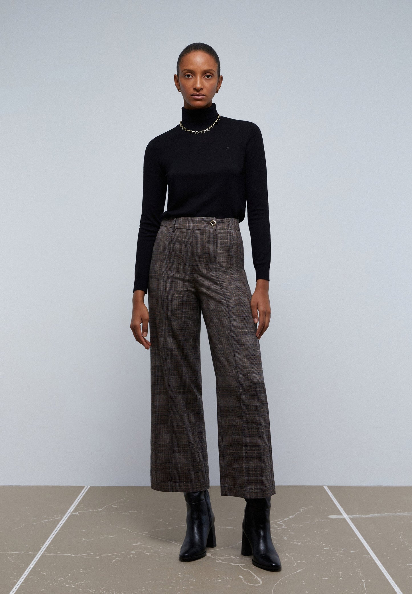 CROSSED LEG CHECK TROUSERS