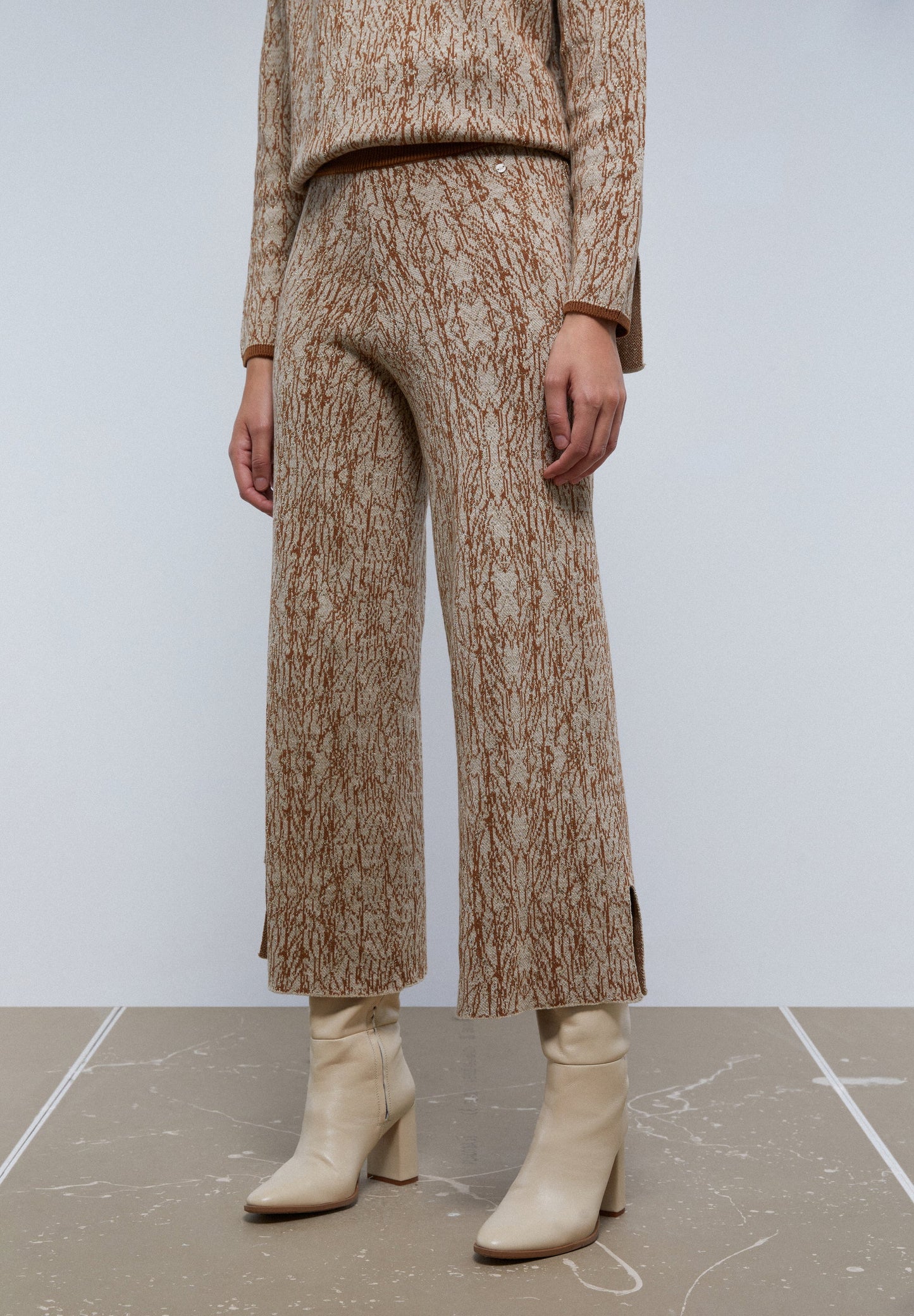 KNIT TROUSERS WITH OPENINGS