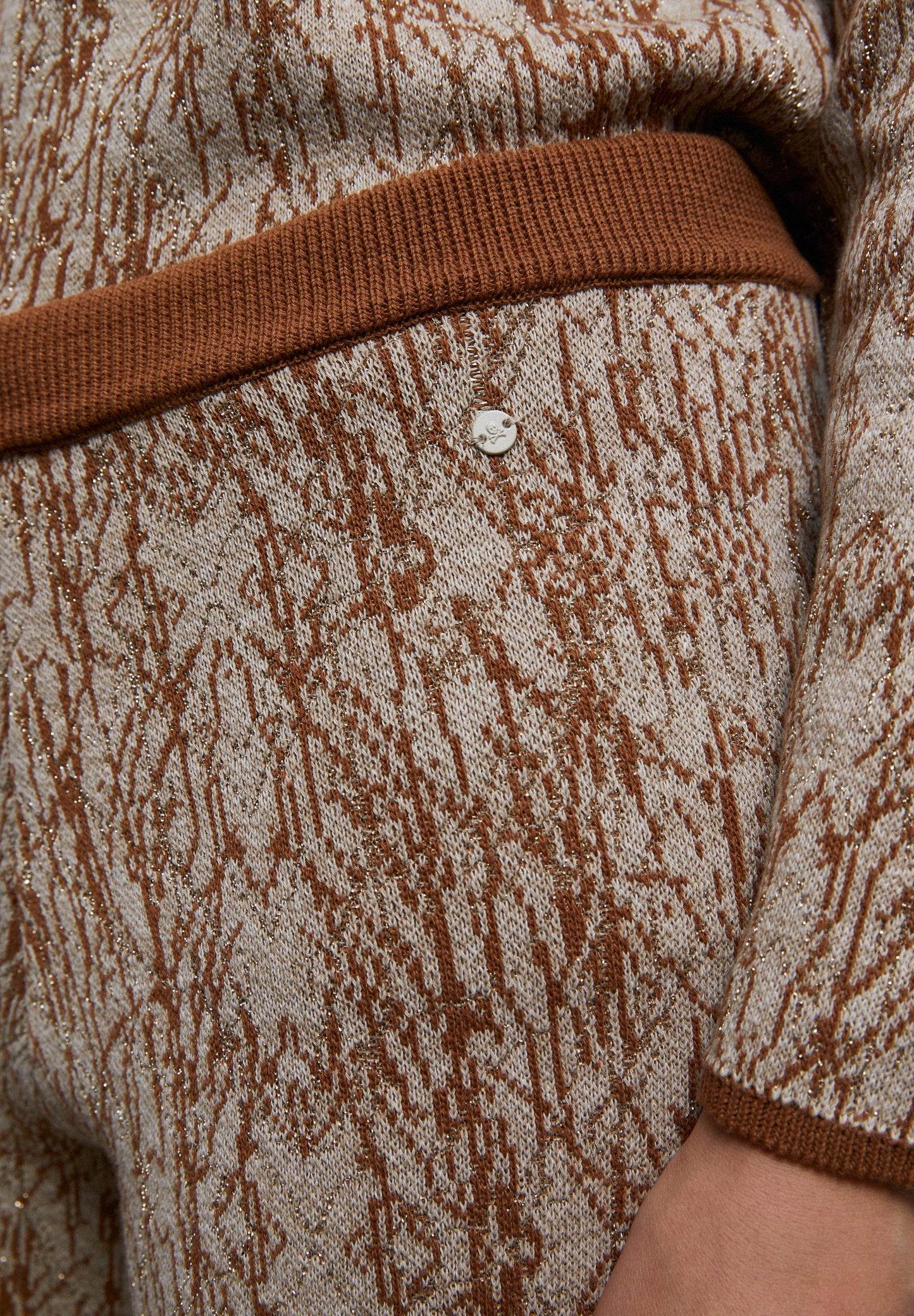 KNIT TROUSERS WITH OPENINGS