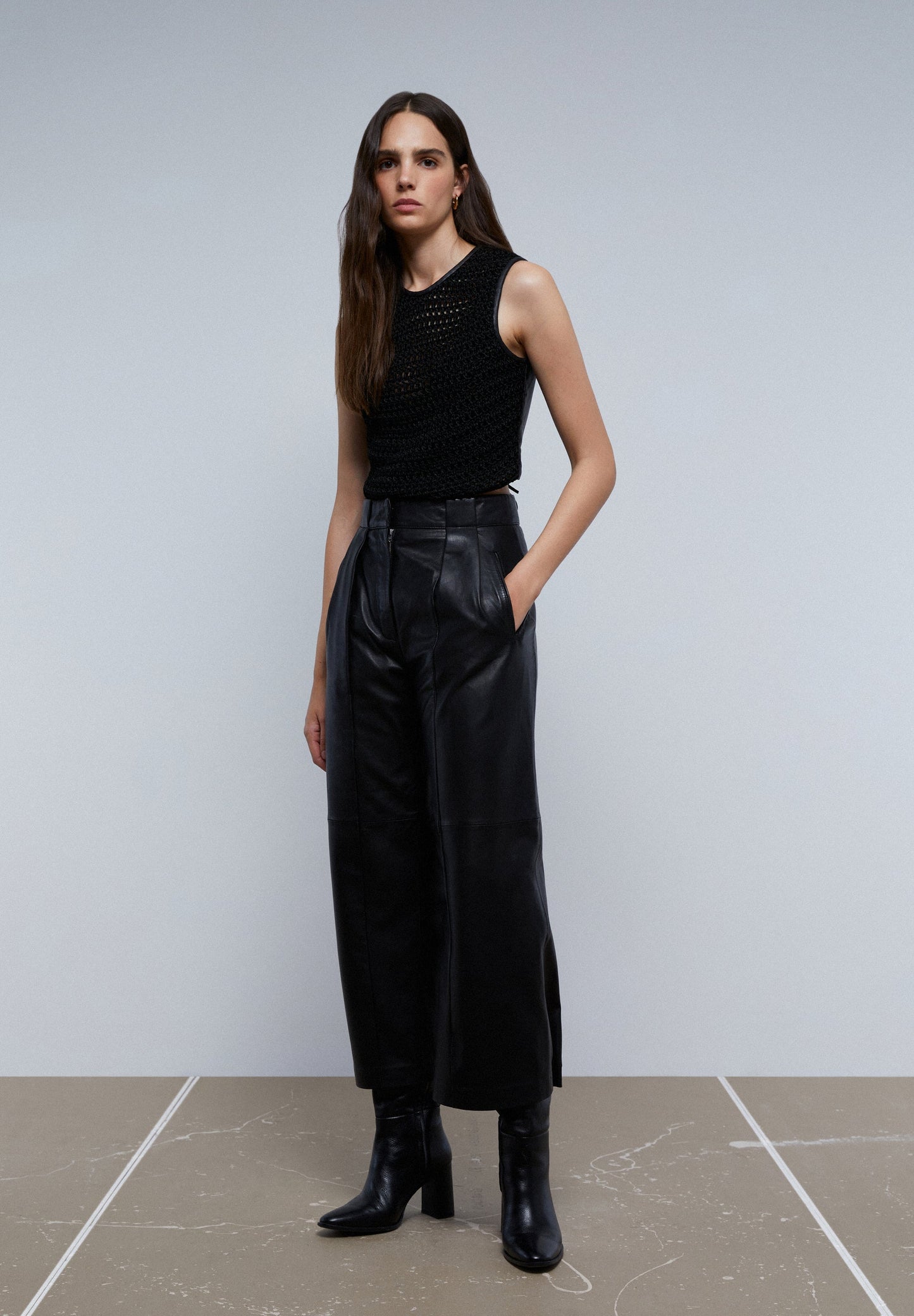 LEATHER TOP WITH BACK DETAIL