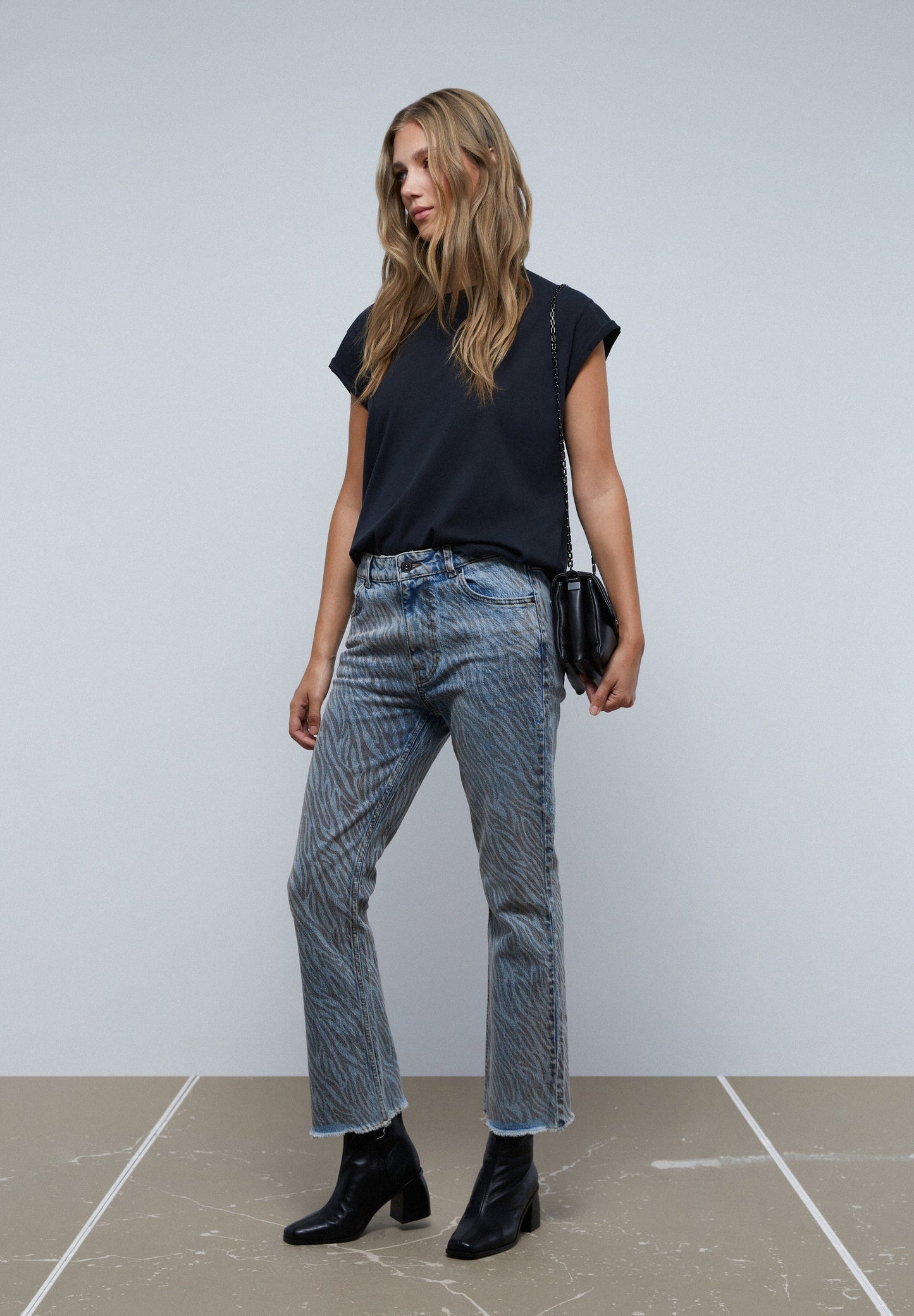 ANIMAL PRINT FLARED ANKLE JEANS