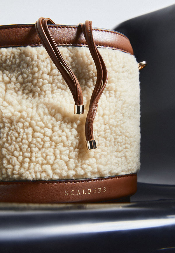 SHEARLING BUCKET BAG