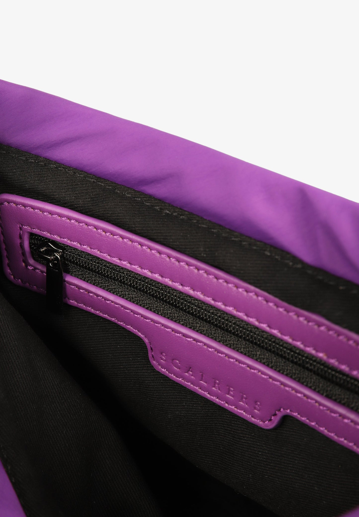 QUILTED BAG WITH MULTIPOSITION HANDLE