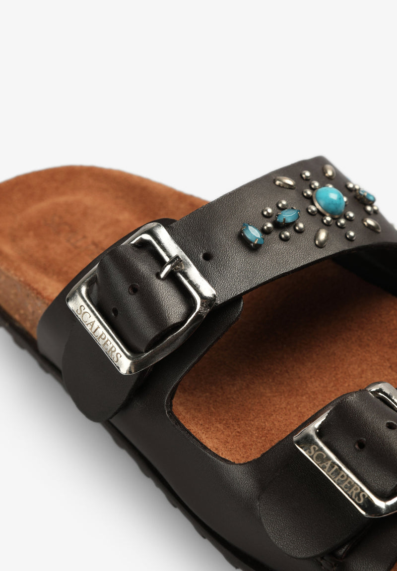 LEATHER SANDALS WITH BUCKLE AND STUDS