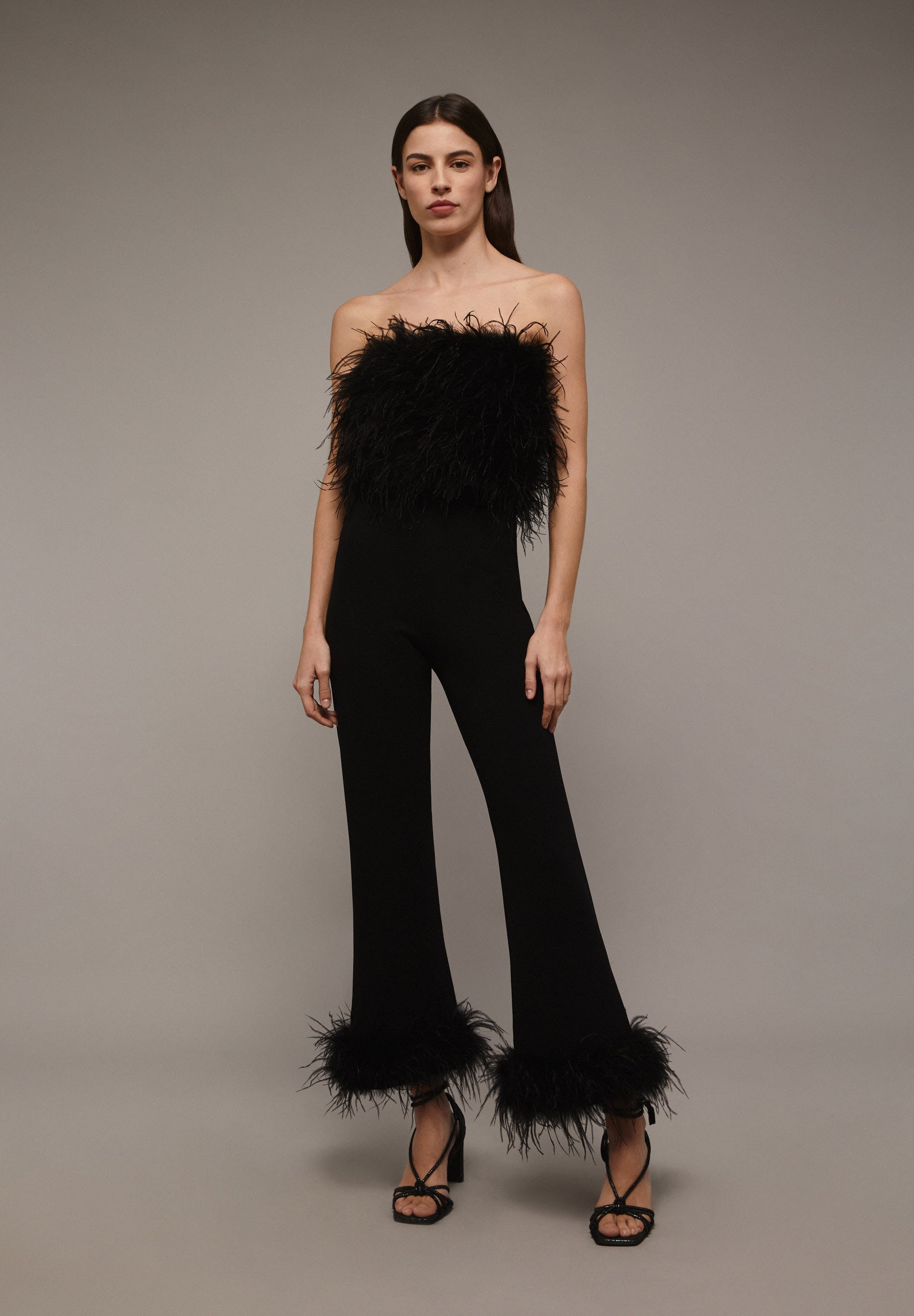 TROUSERS WITH FEATHERED HEM DETAIL
