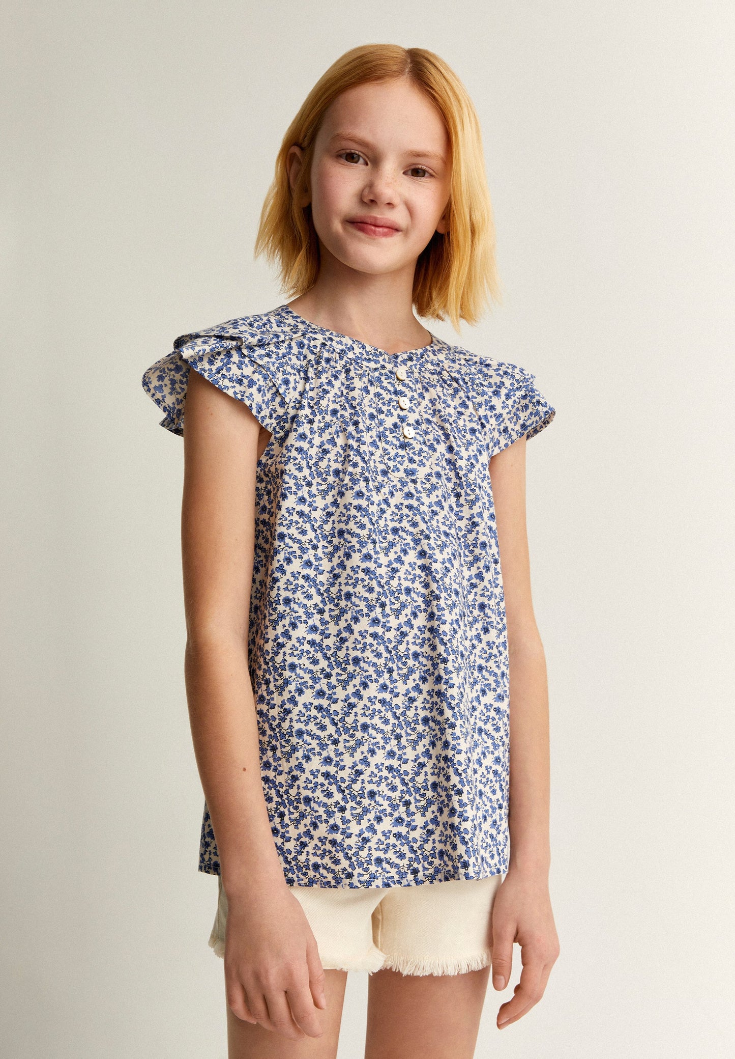 FLORAL BLOUSE WITH RUFFLED SHOULDER