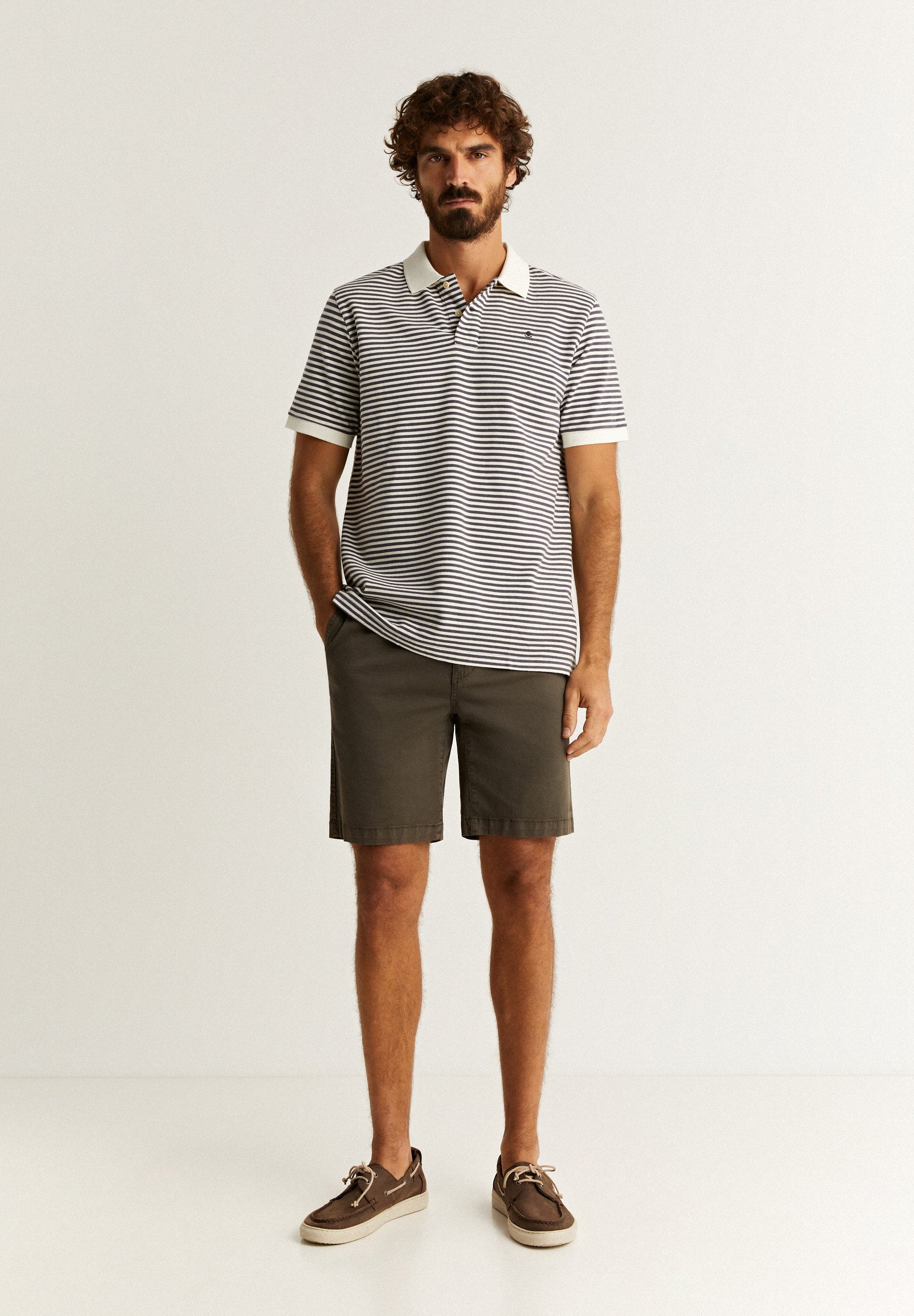 STRIPED POLO SHIRT WITH CONTRAST SKULL