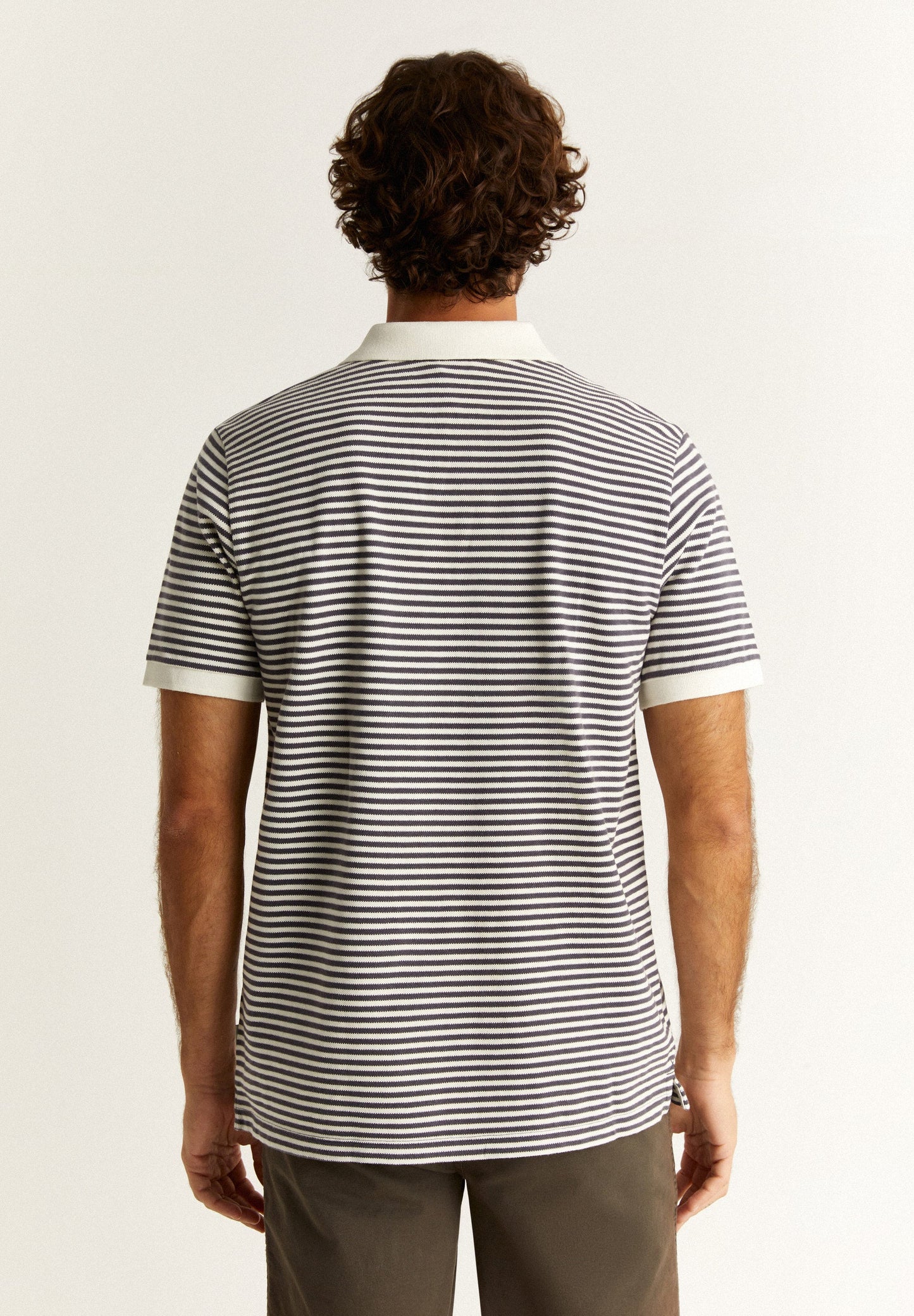 STRIPED POLO SHIRT WITH CONTRAST SKULL