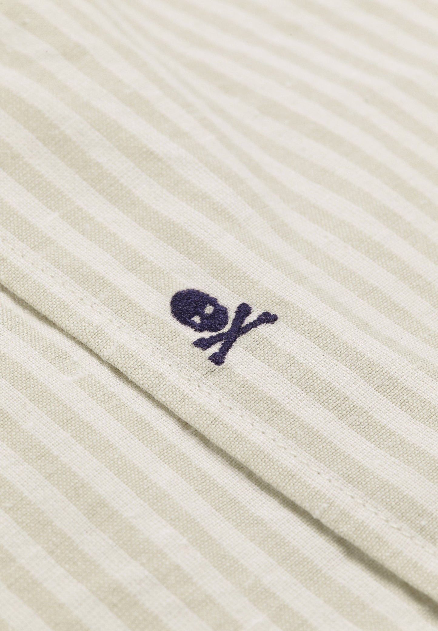 STRIPED SHIRT WITH SKULL AND FLAP