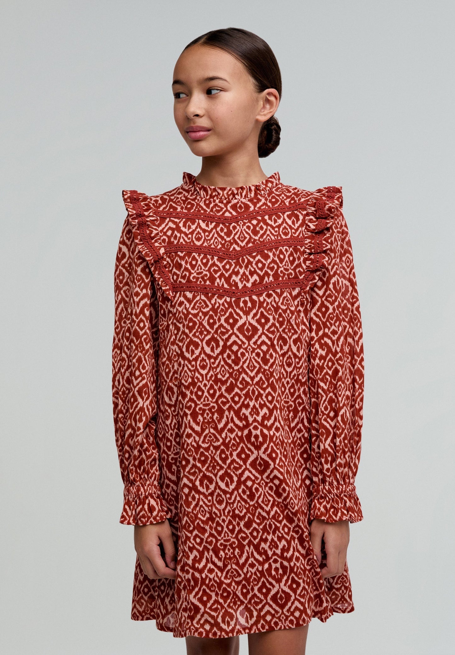 RUFFLED DRESS WITH AN ETHNIC PRINT