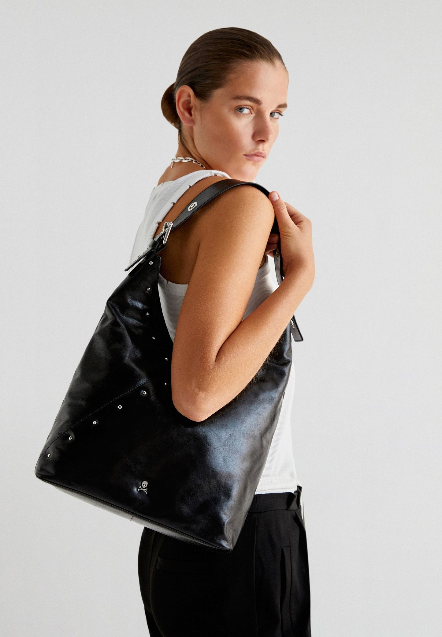 STUDDED LEATHER HOBO BAG