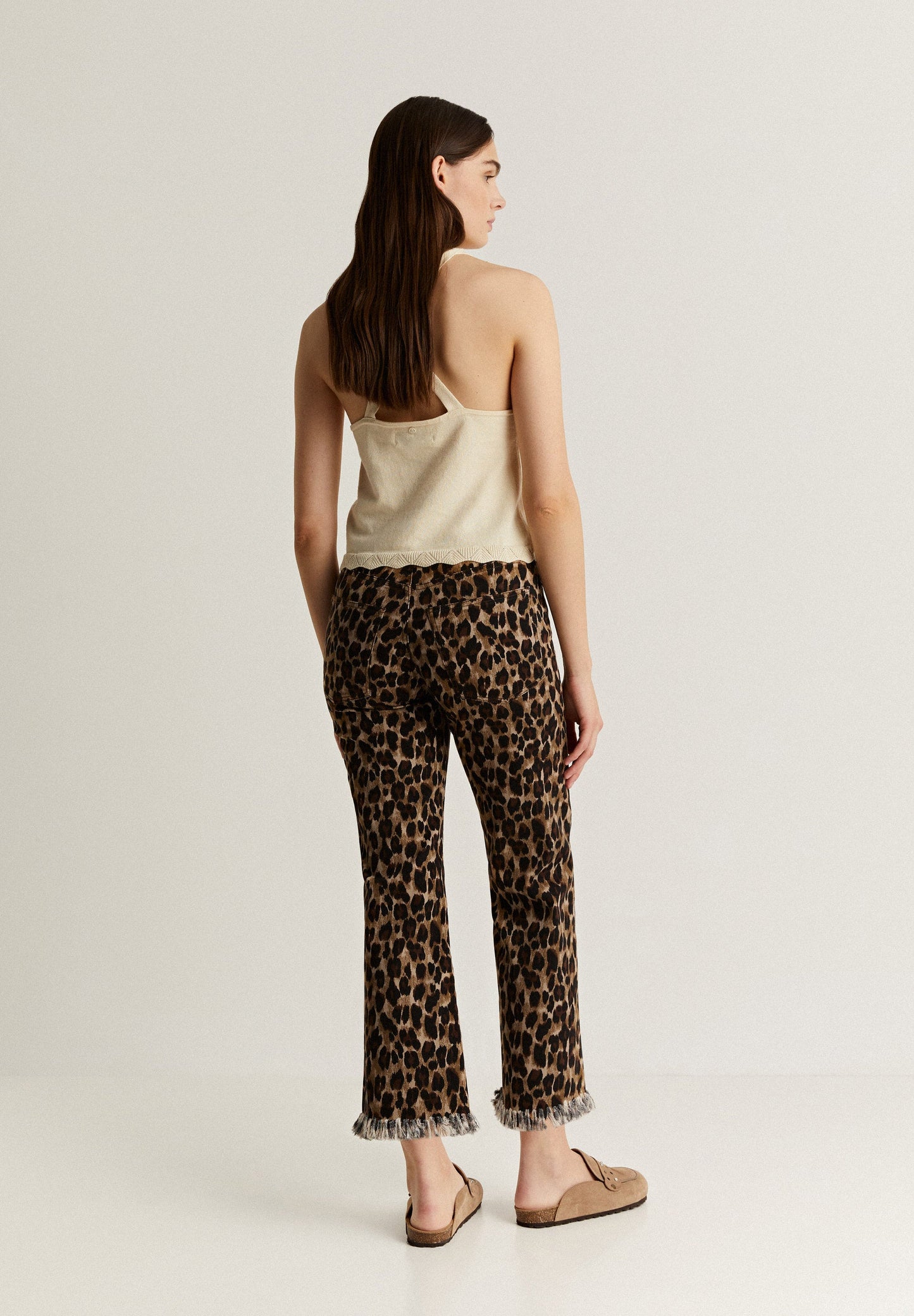 ANIMAL PRINT TROUSERS WITH FRAYED HEM