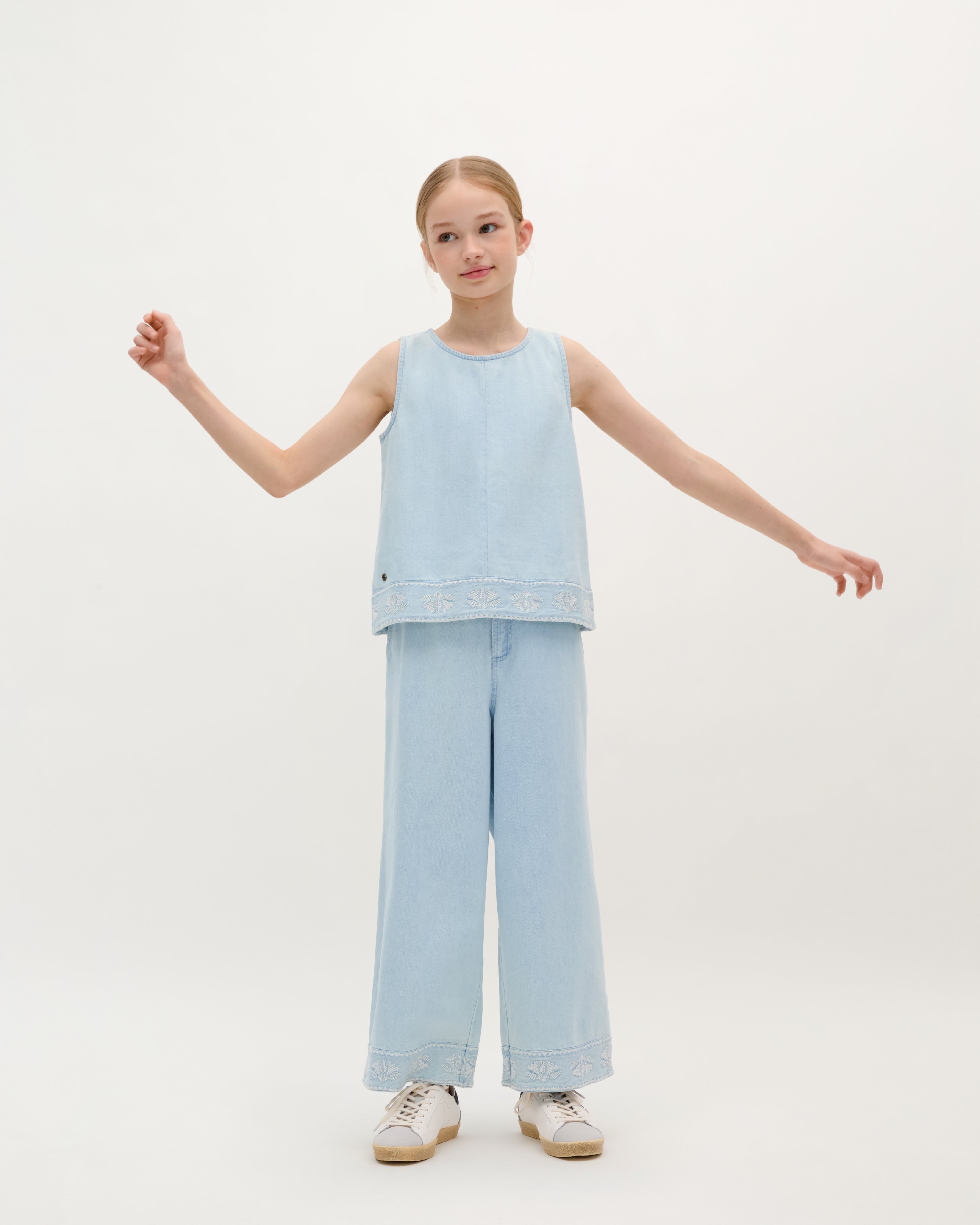 TROUSERS WITH EMBROIDERED DETAILS