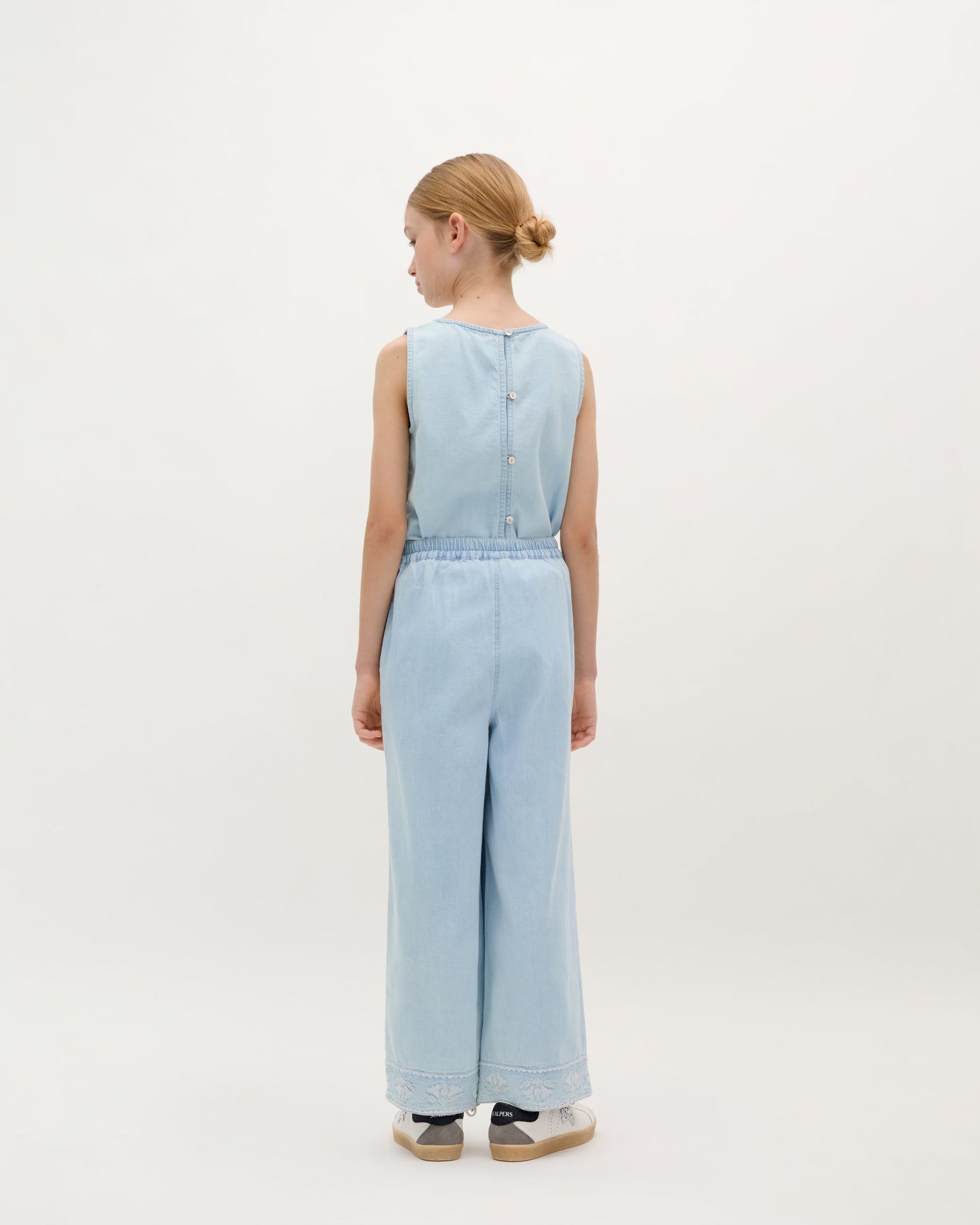 TROUSERS WITH EMBROIDERED DETAILS