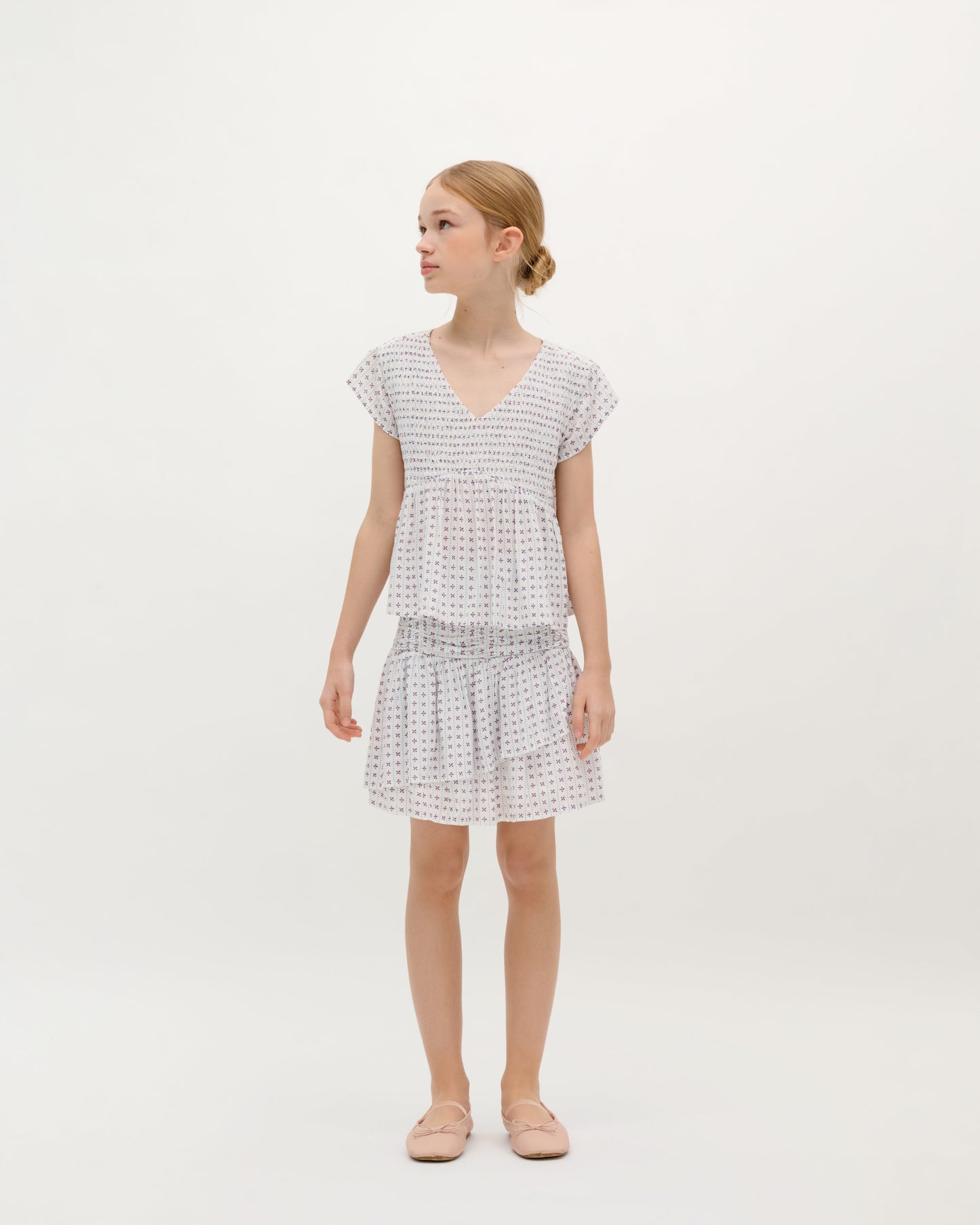 SMOCKED ASYMMETRIC SKIRT