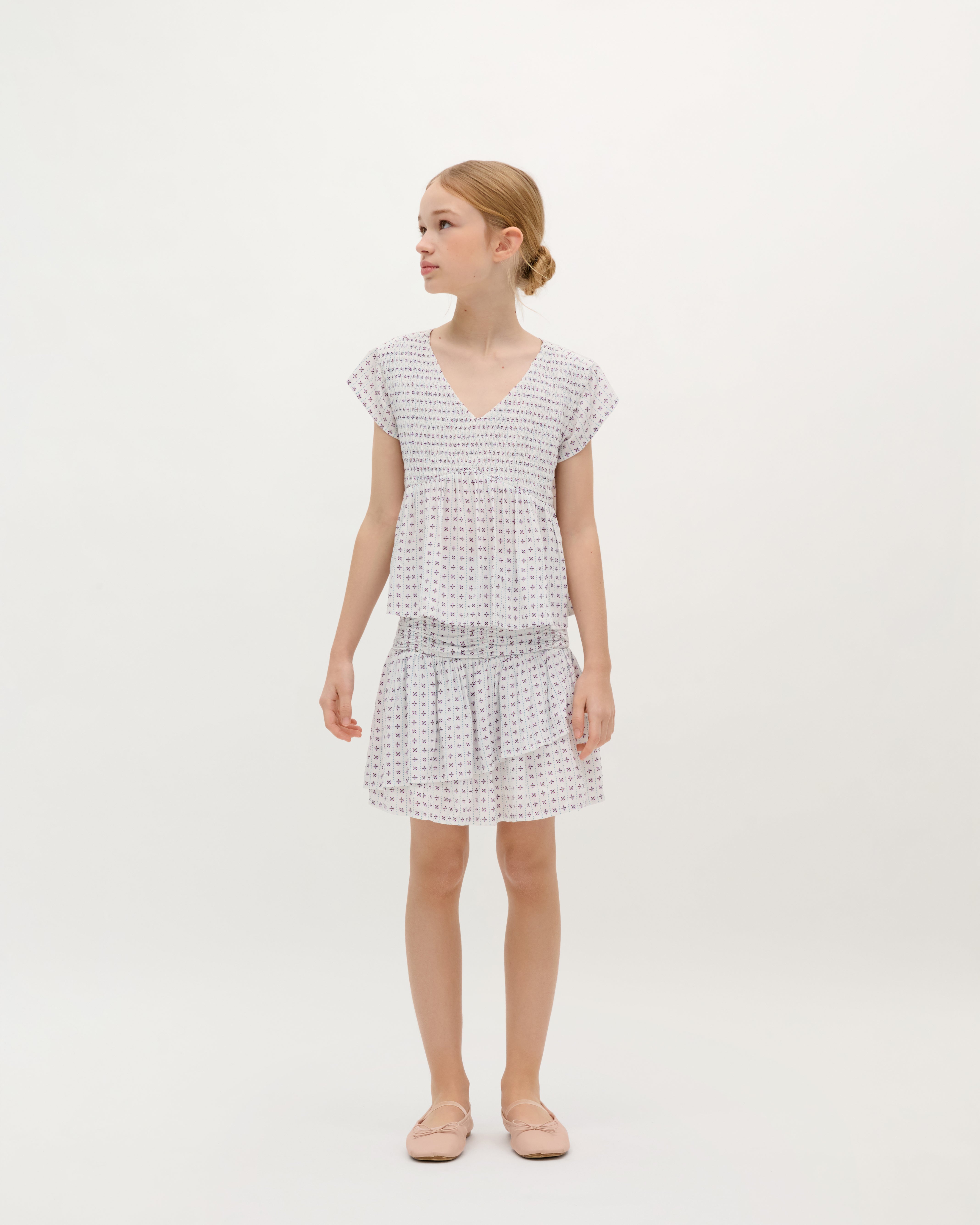 SMOCKED ASYMMETRIC SKIRT