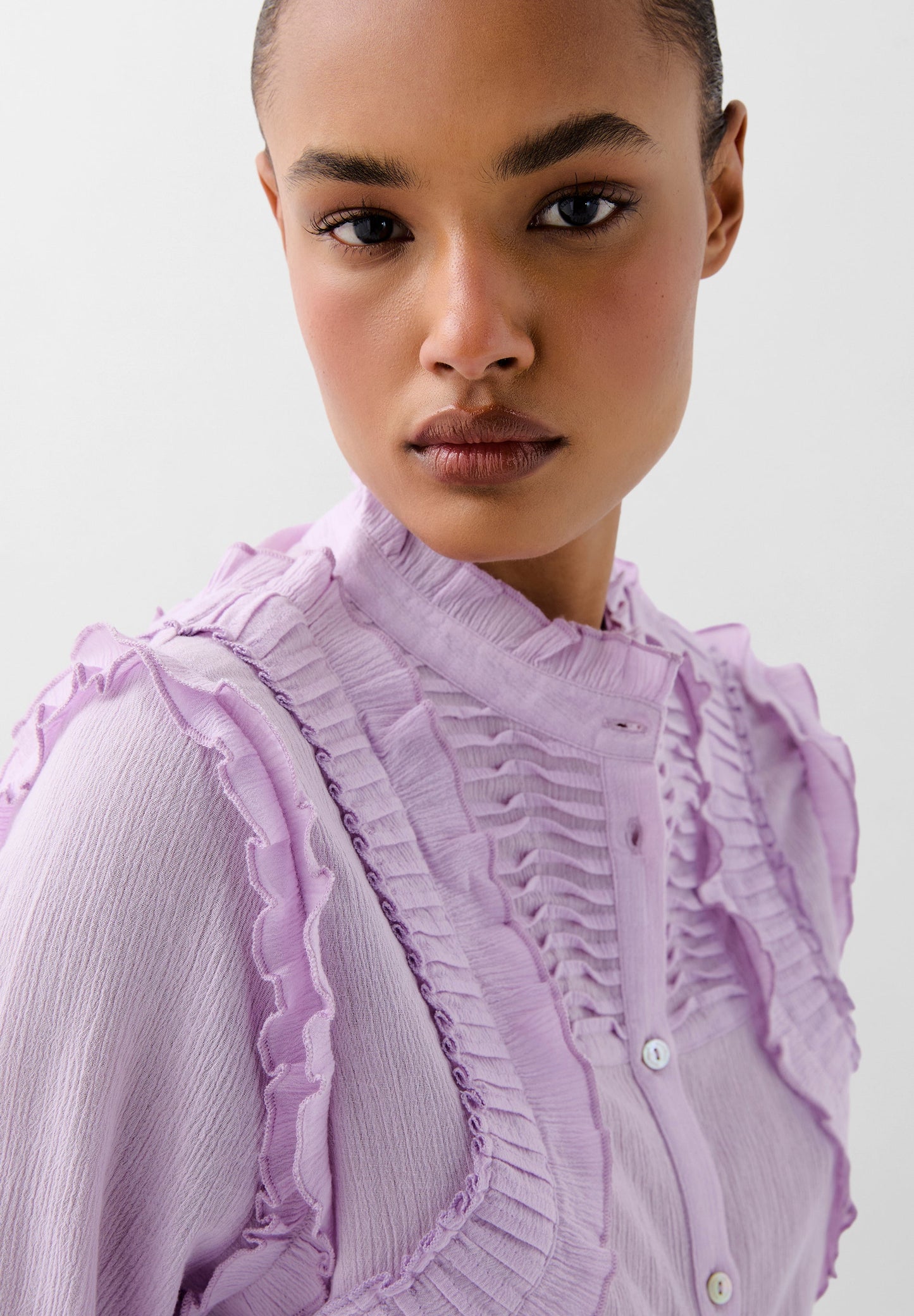 SHIRT WITH PLEATED GATHERED DETAILS