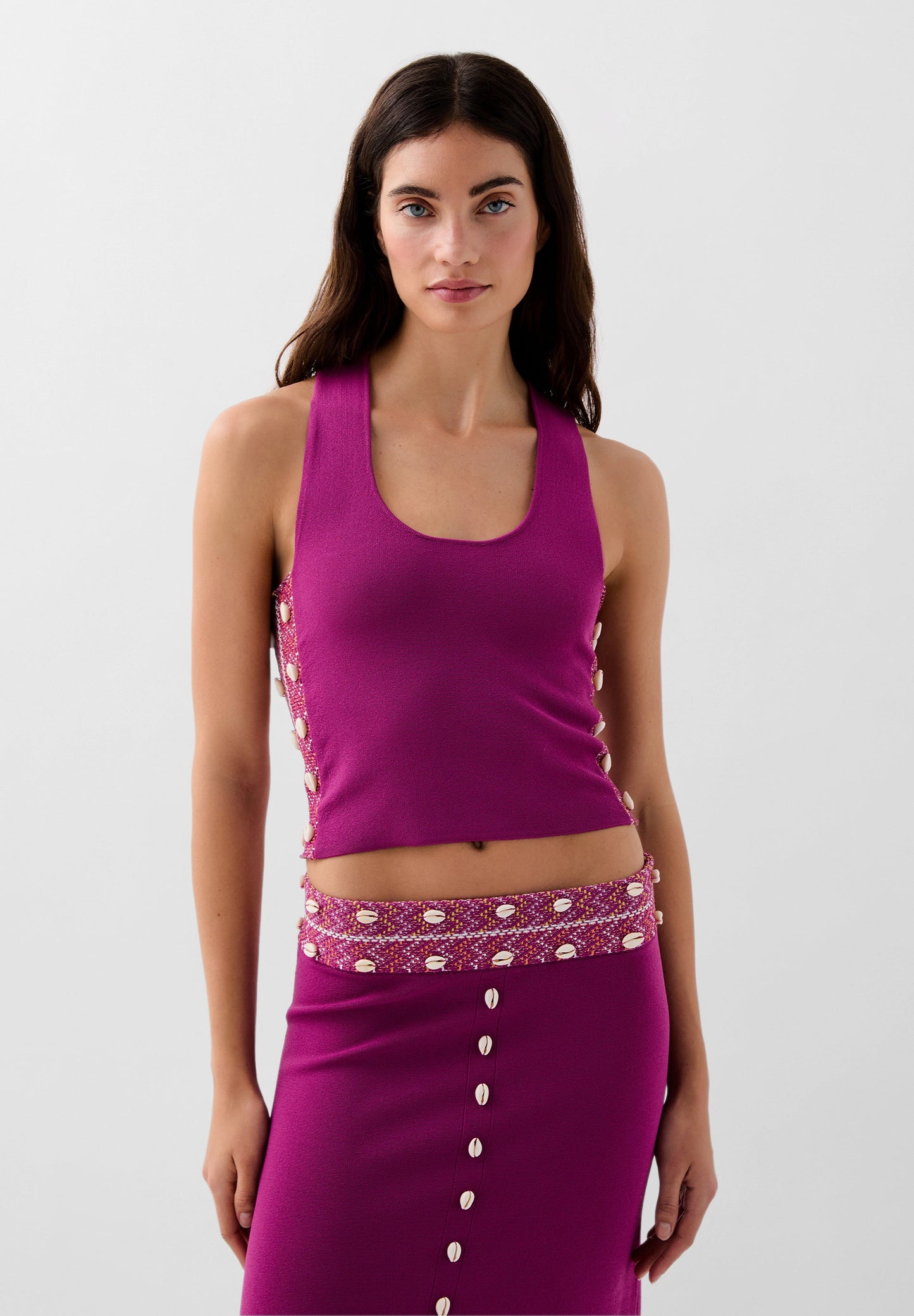 KNIT TOP WITH SHELL DETAILS