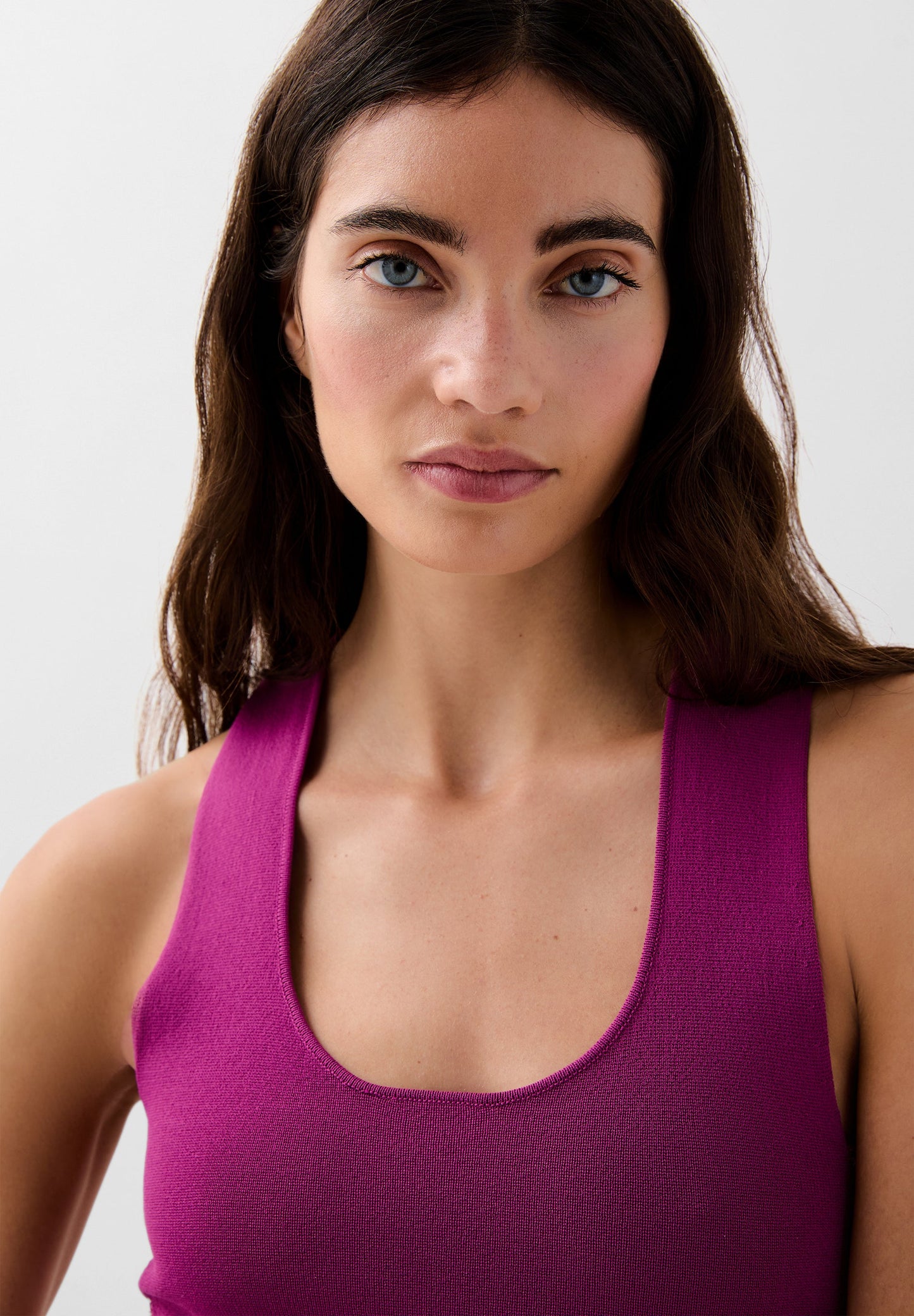 KNIT TOP WITH SHELL DETAILS