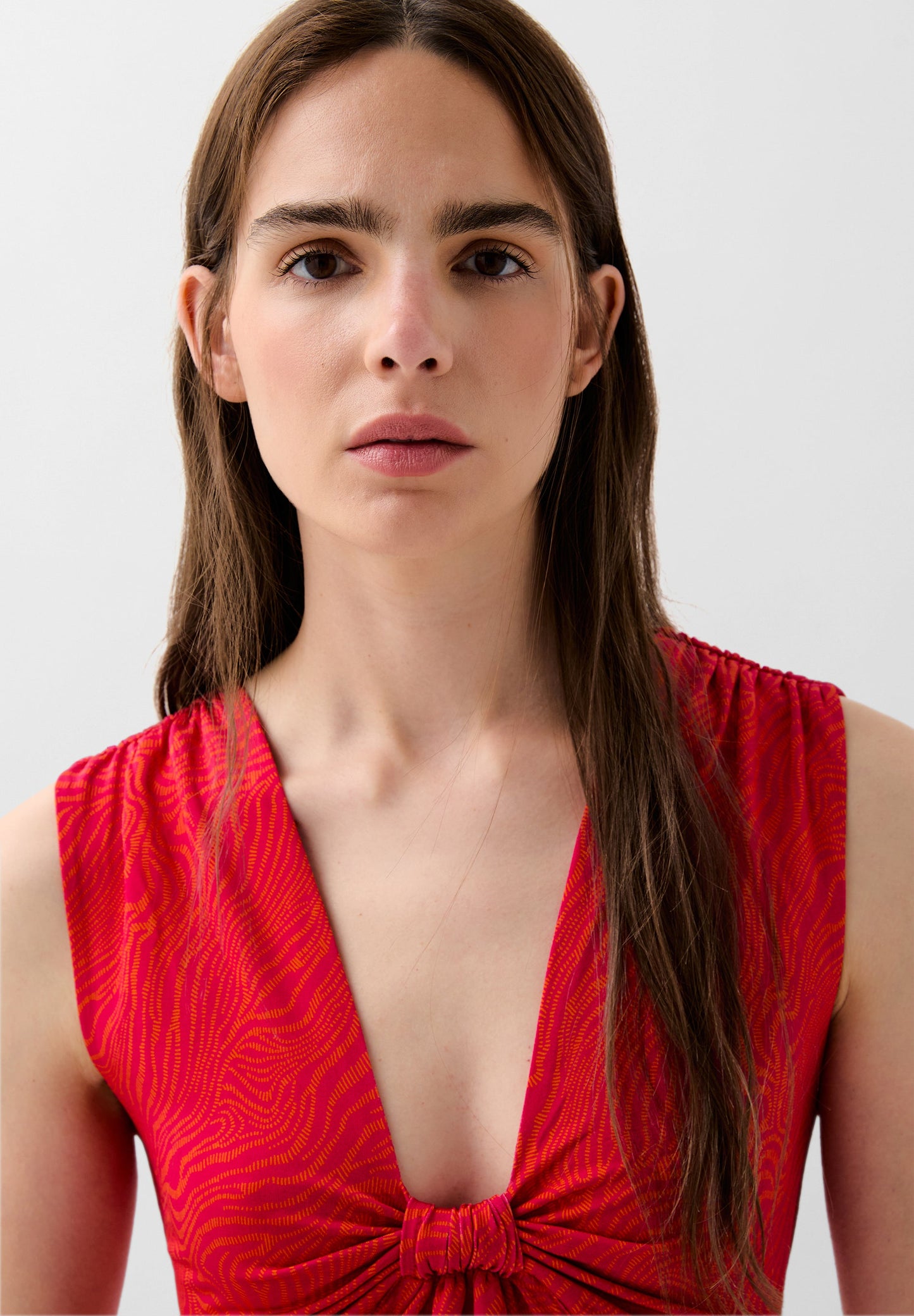 DRESS WITH KNOT DETAIL AND SLITS