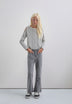 FLARED TROUSERS WITH FRINGING